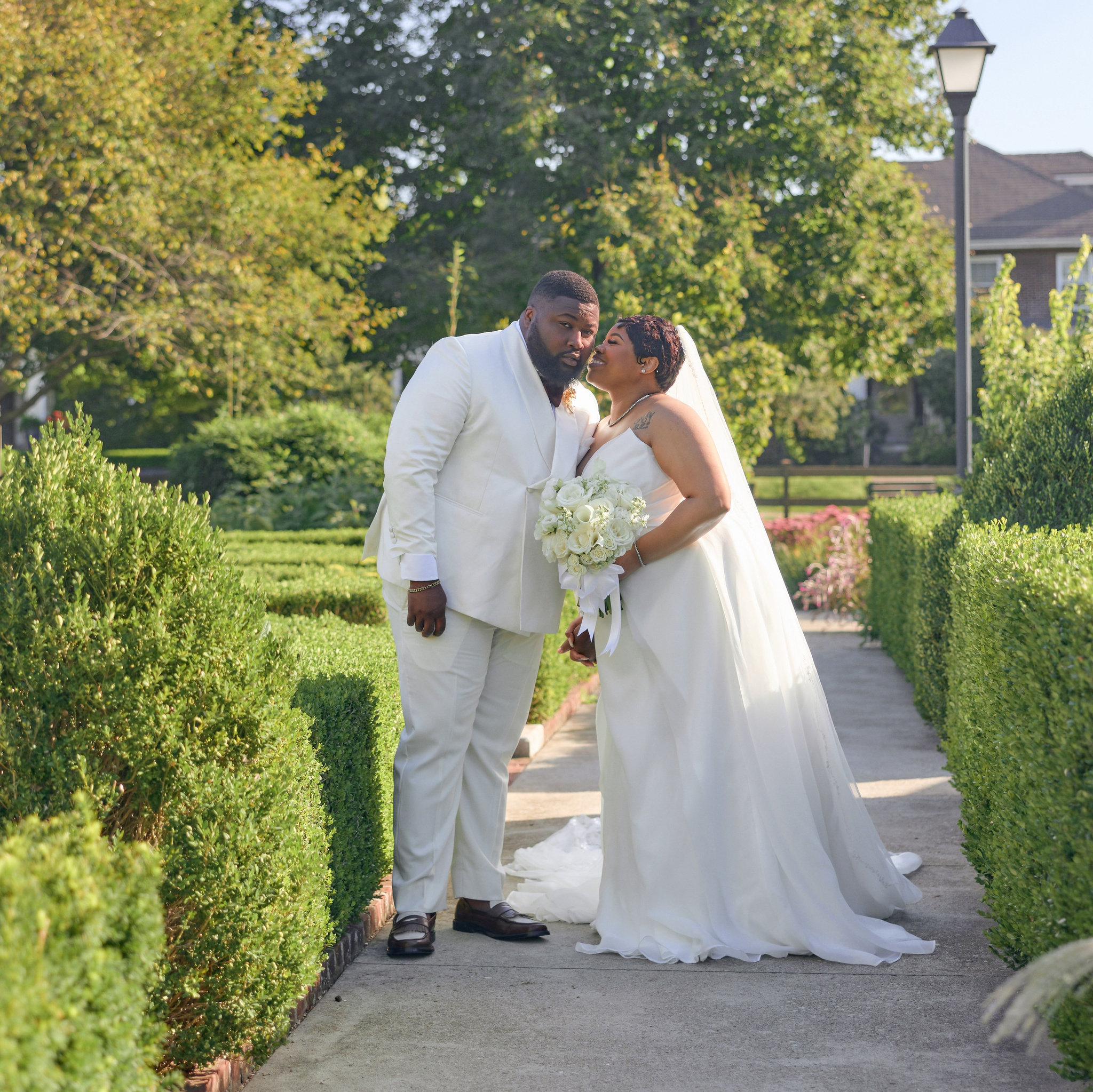 Romantic kiss on a garden path in Columbus, Ohio
