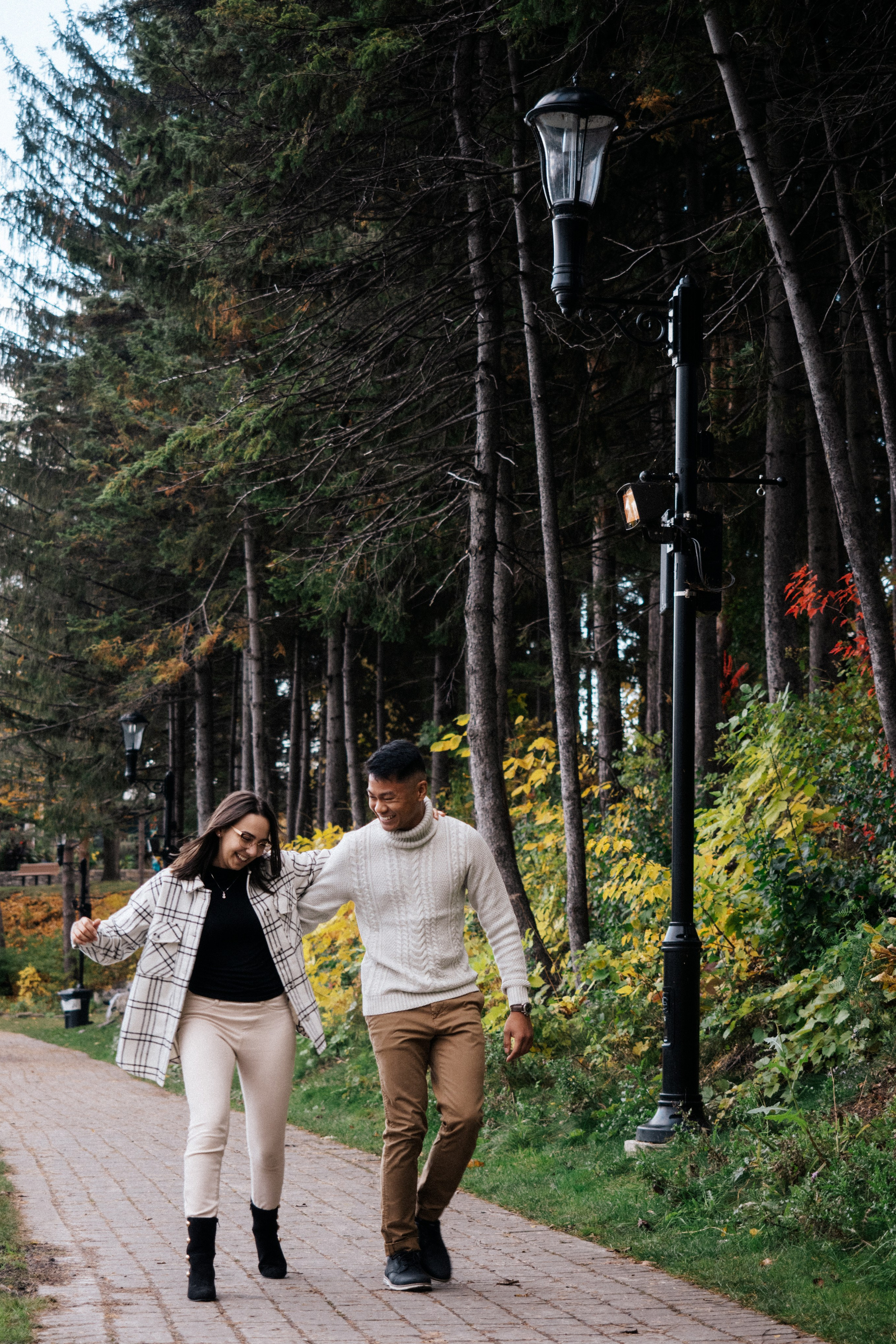 Family of four kissing and hugging in Montreal, Canada. 