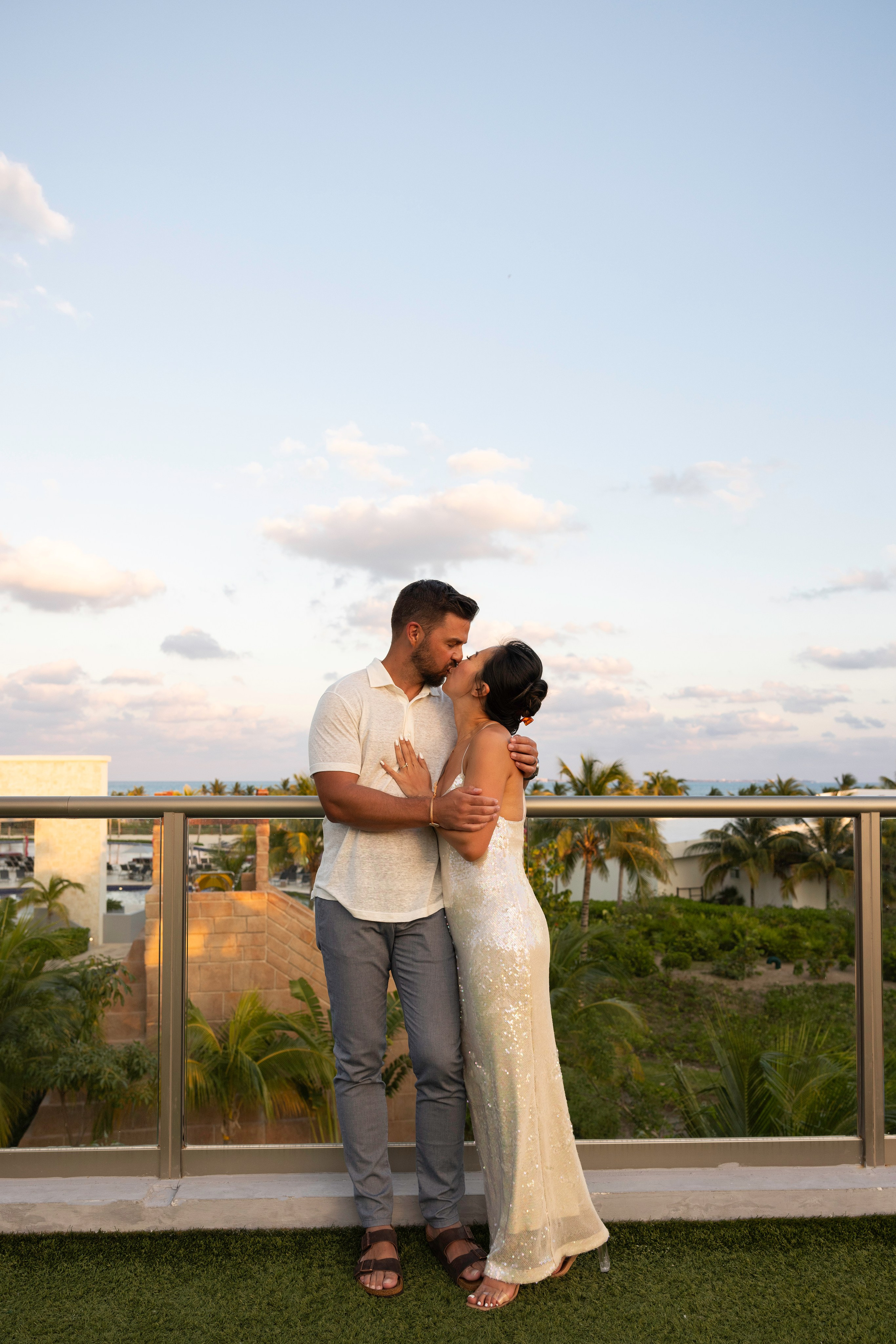 Romantic moment of couple kissing during the sunset in Cancun.