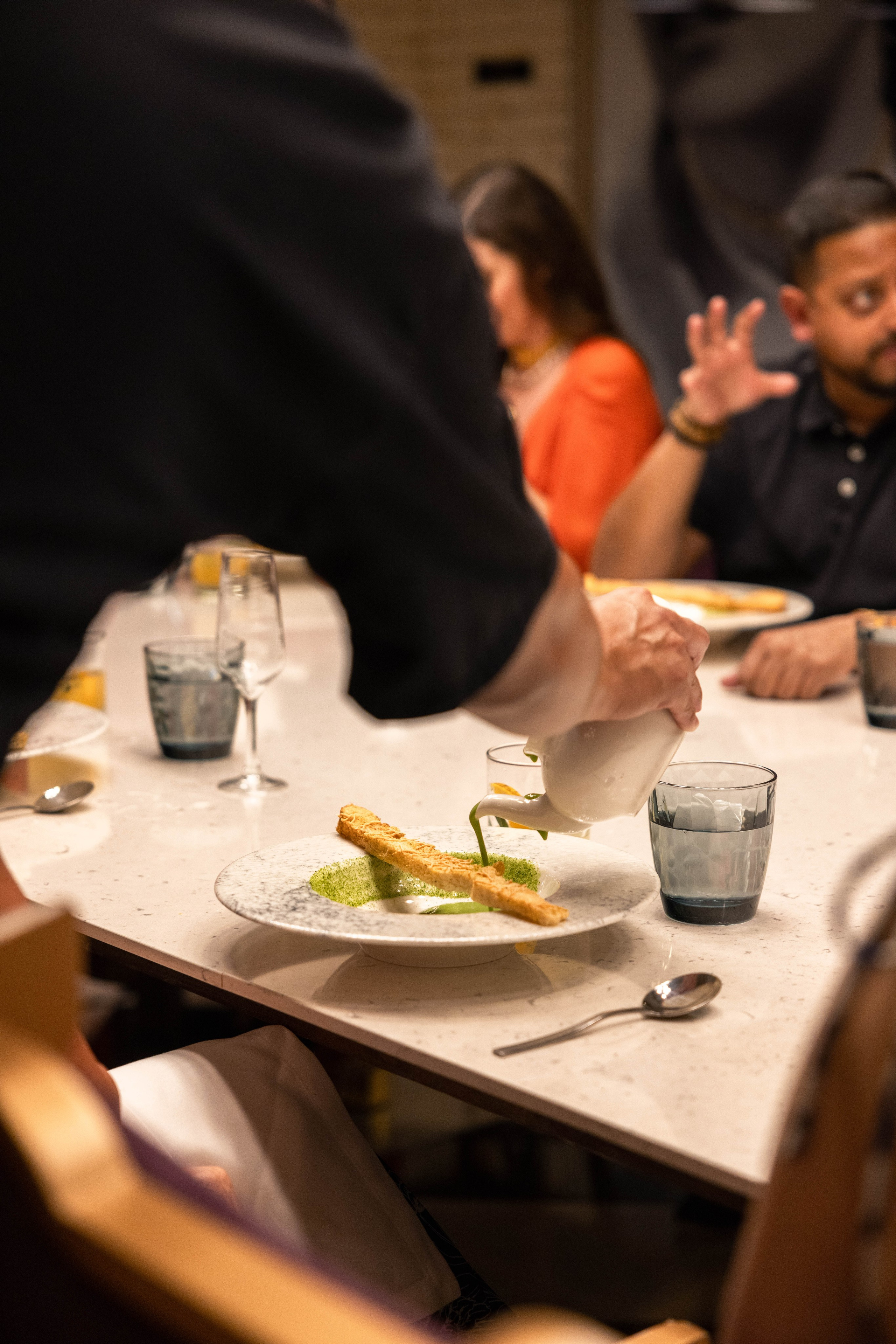 Colorful wedding welcome dinner plates styled with local Mexican cuisine