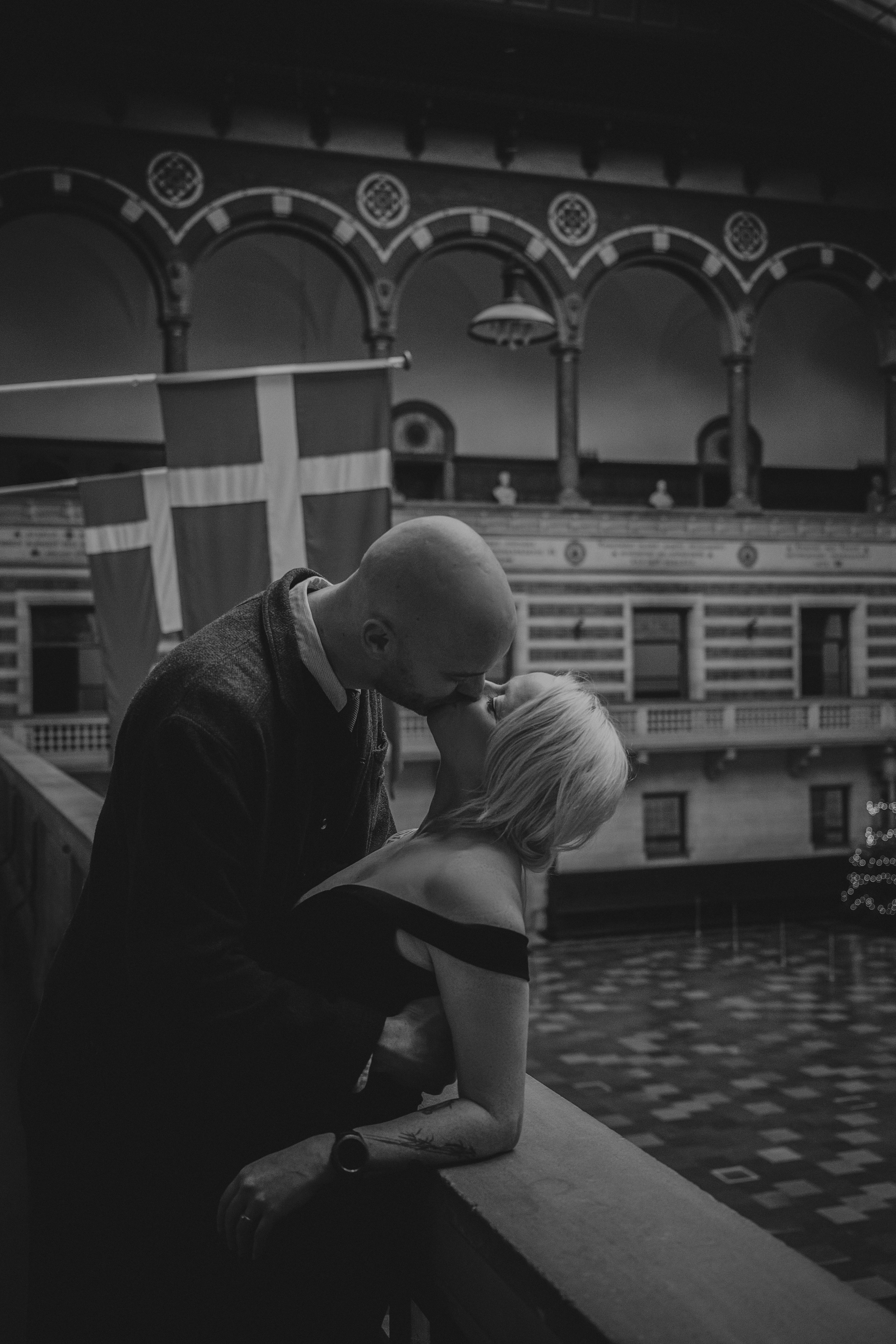 Bride and groom sharing a quiet moment inside Copenhagen City Hall