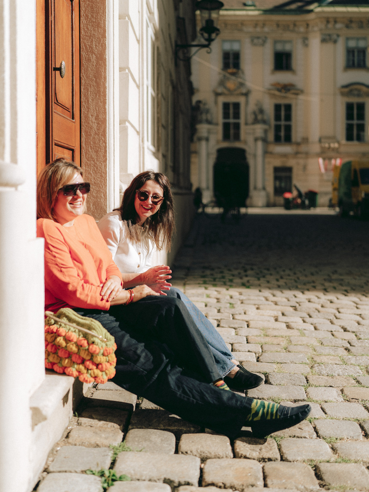 Two women relaxing during a photo walk