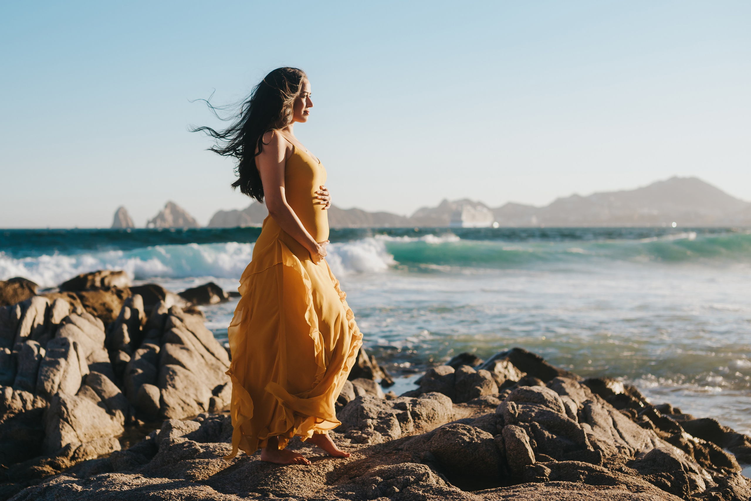 Maternity photo session at medano beach, los Cabos