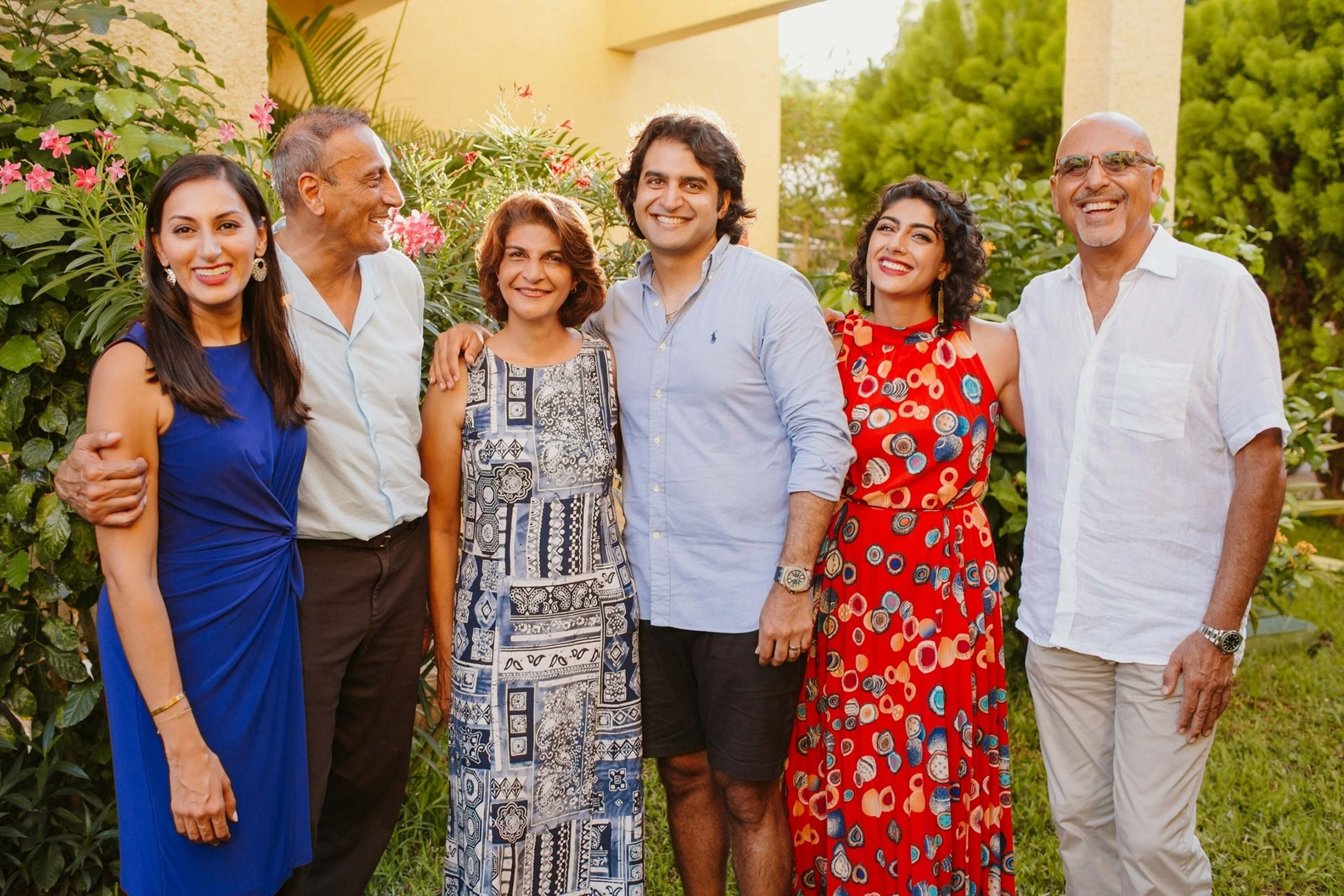 Artistic family portrait with soft natural light, genuine laughter, and candid storytelling style in Mombasa, Kenya.