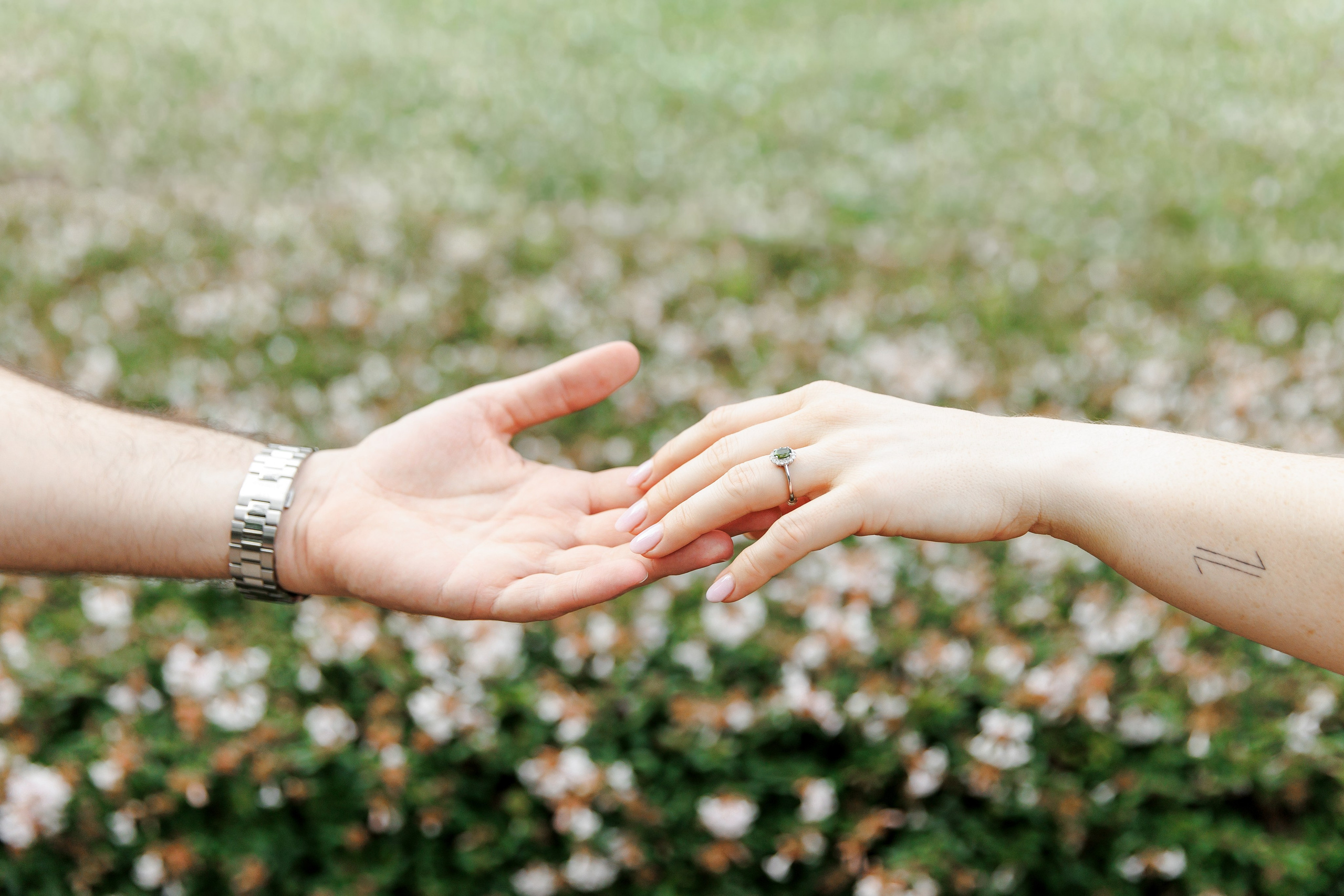 Hands holding an engagement ring during a professional photosession in Barcelona 