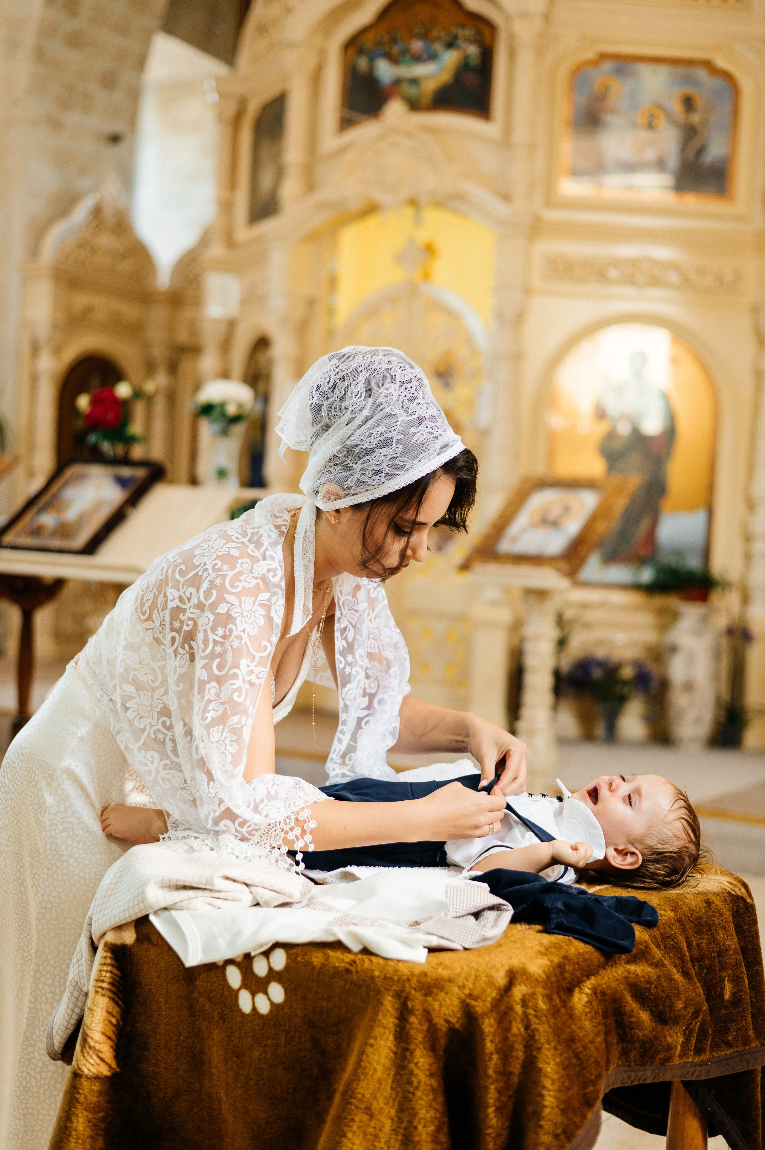 Botezul lui Robert. Fotograf Cătălina Munteanu