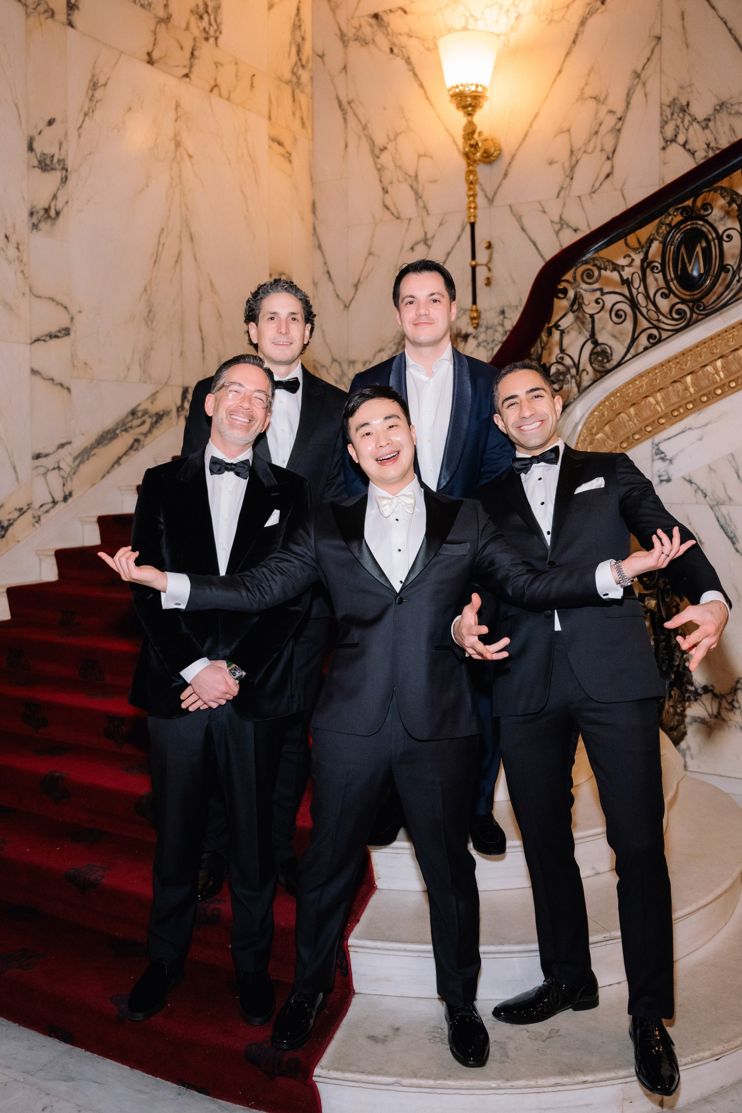 a group of men in tuxed tuxed tuxed tuxed tuxed tuxed tuxed