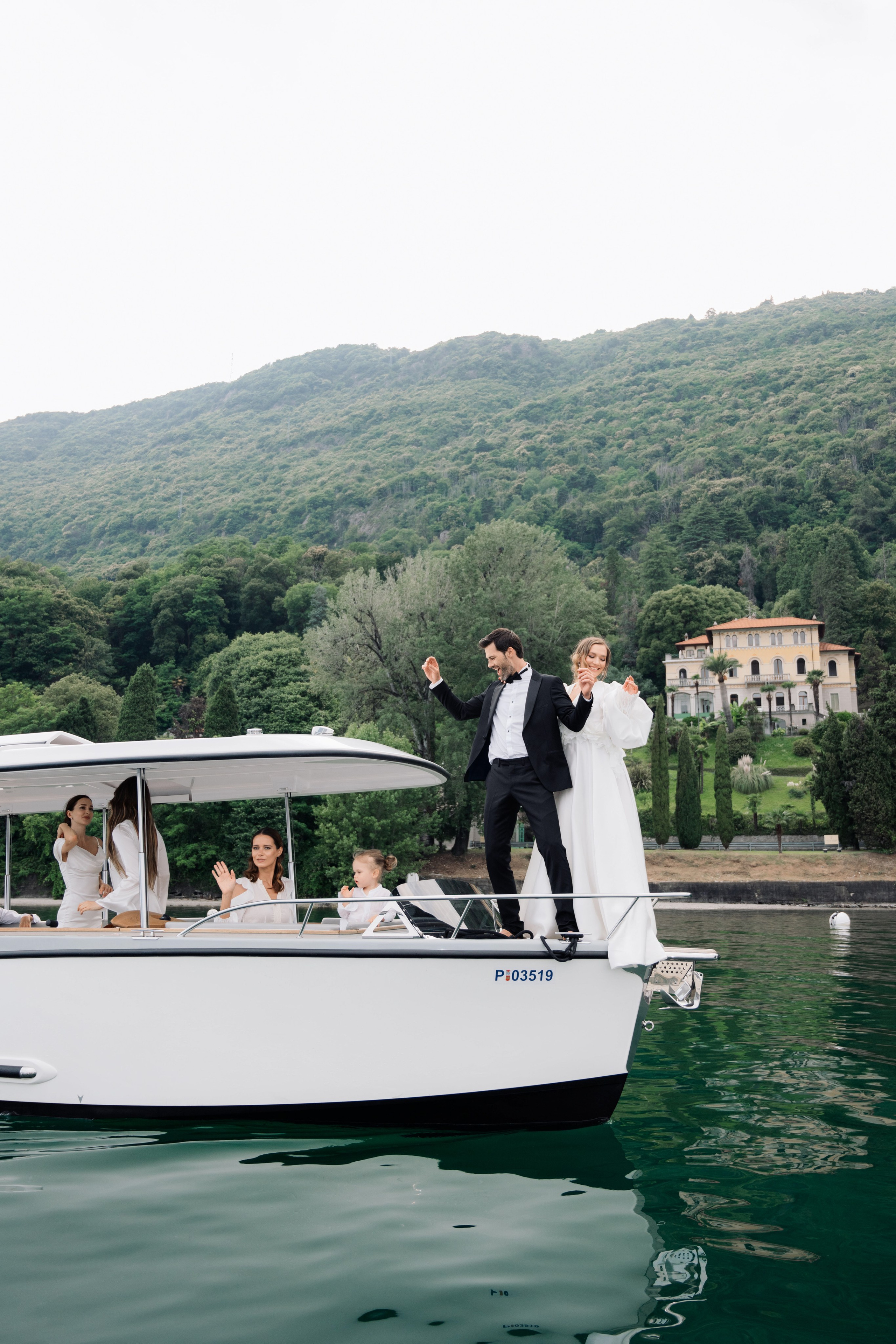 a bride and groom on a boat