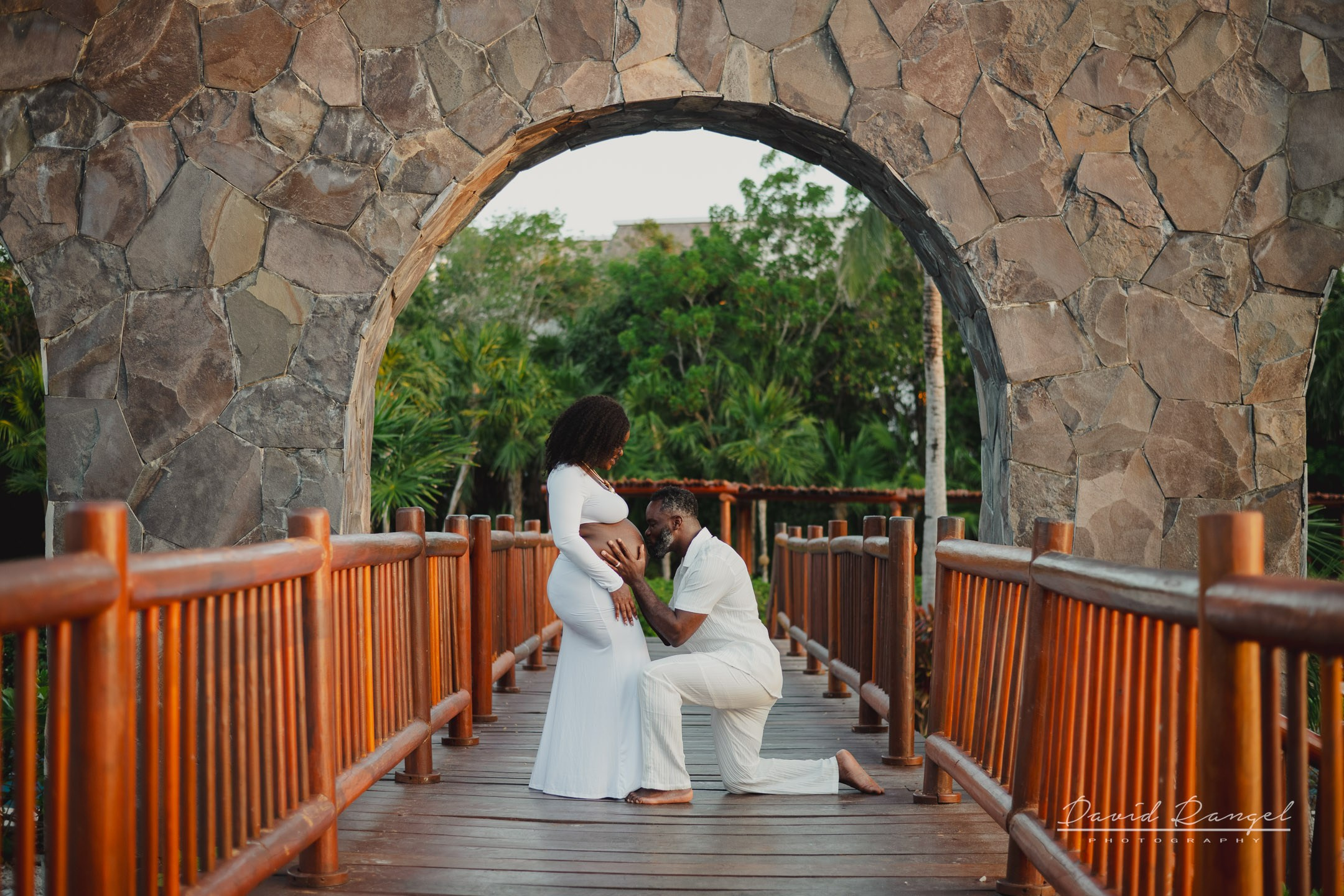 Maternity session of Ketsia & Ricketson at the beautiful colonial-style Valentin Imperial Maya Hotel. Destination wedding photographer based in Cancun and Riviera Maya with service worldwide
