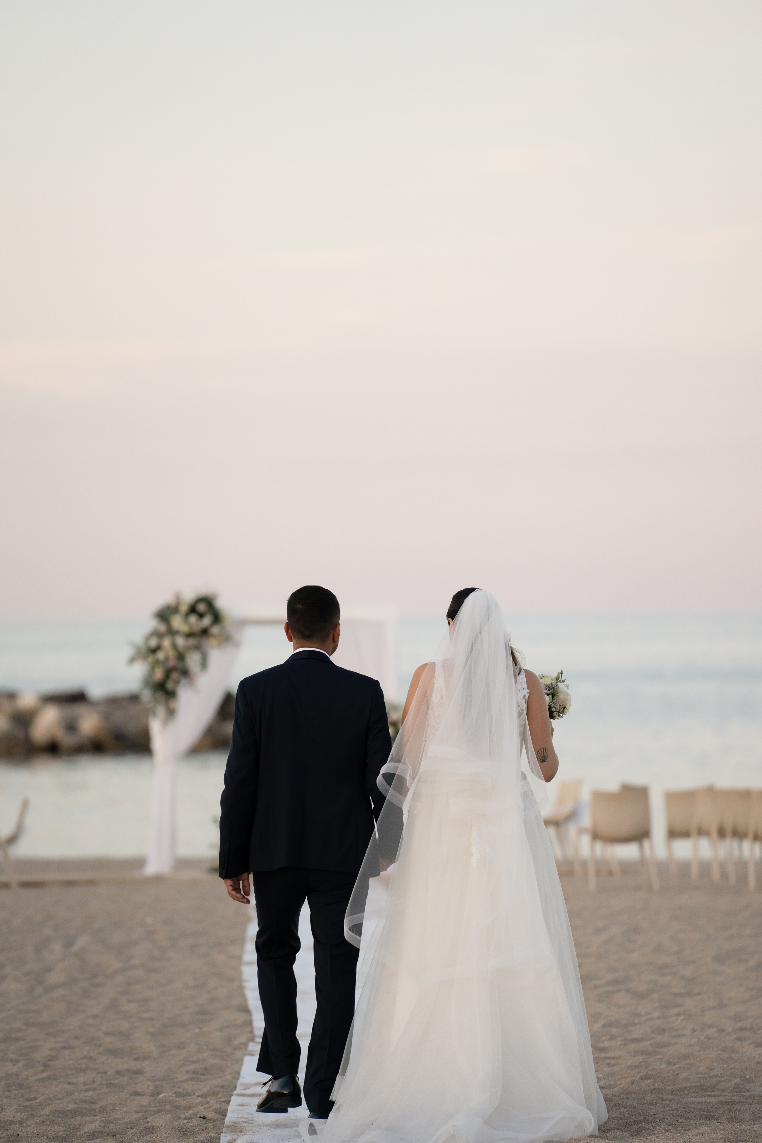 Valentina&Armando. Wedding on the beach. Family and wedding photographer in Italy Olga Kulikova
