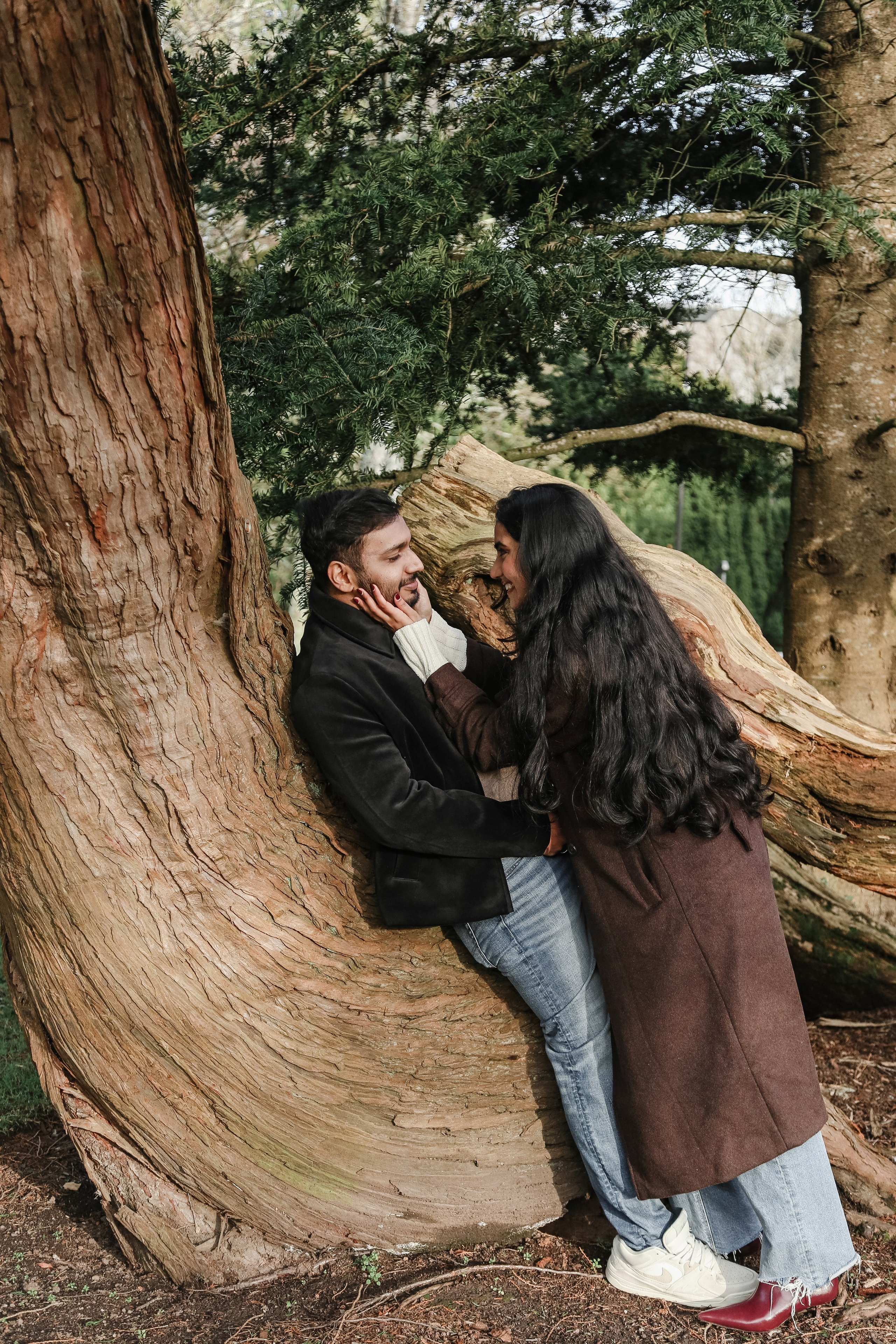 A close and emotional portrait framed by natural textures, focusing on trust, affection, and quiet intimacy.