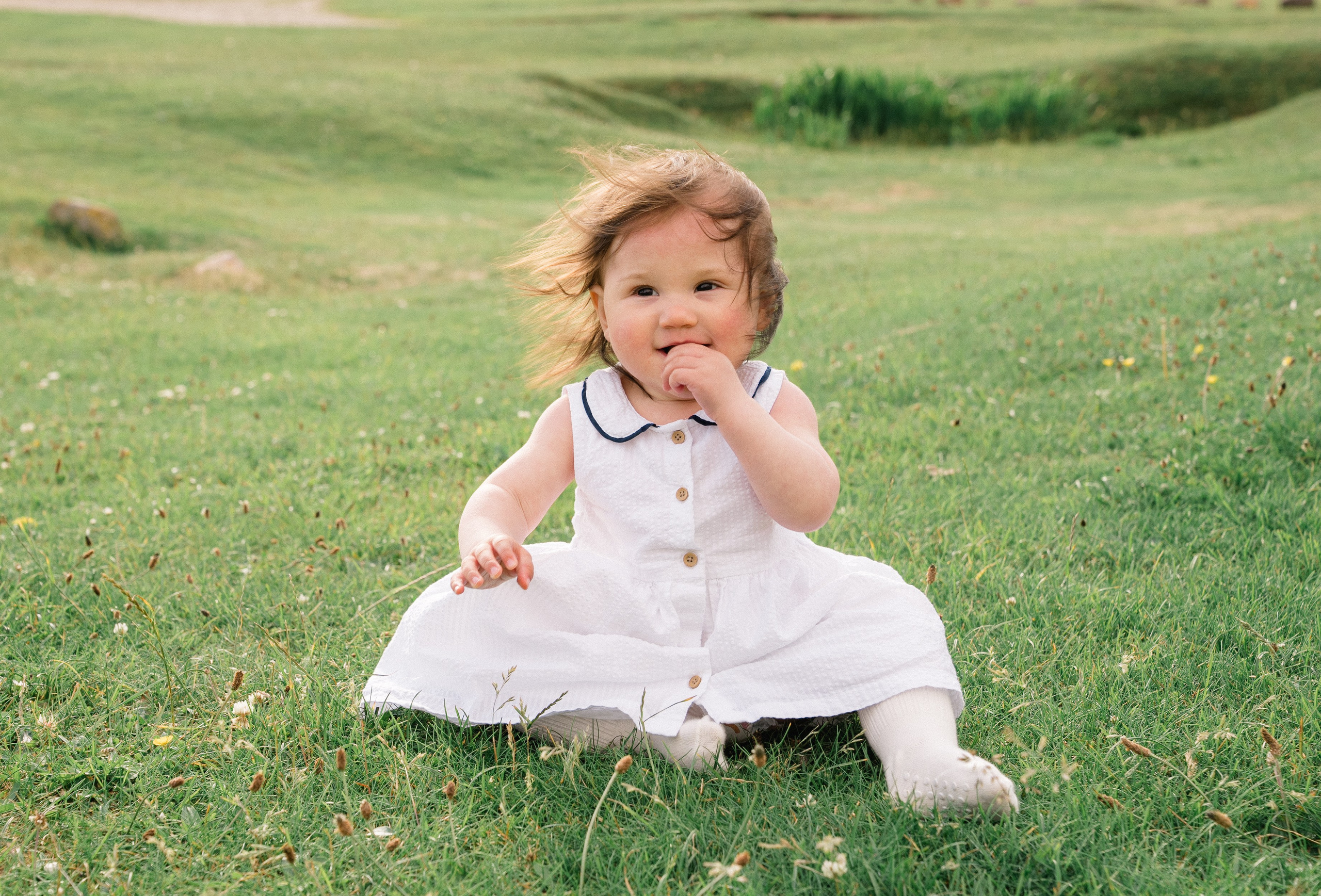 Darya and Mia at the ocean. Wedding and family photographer Ireland