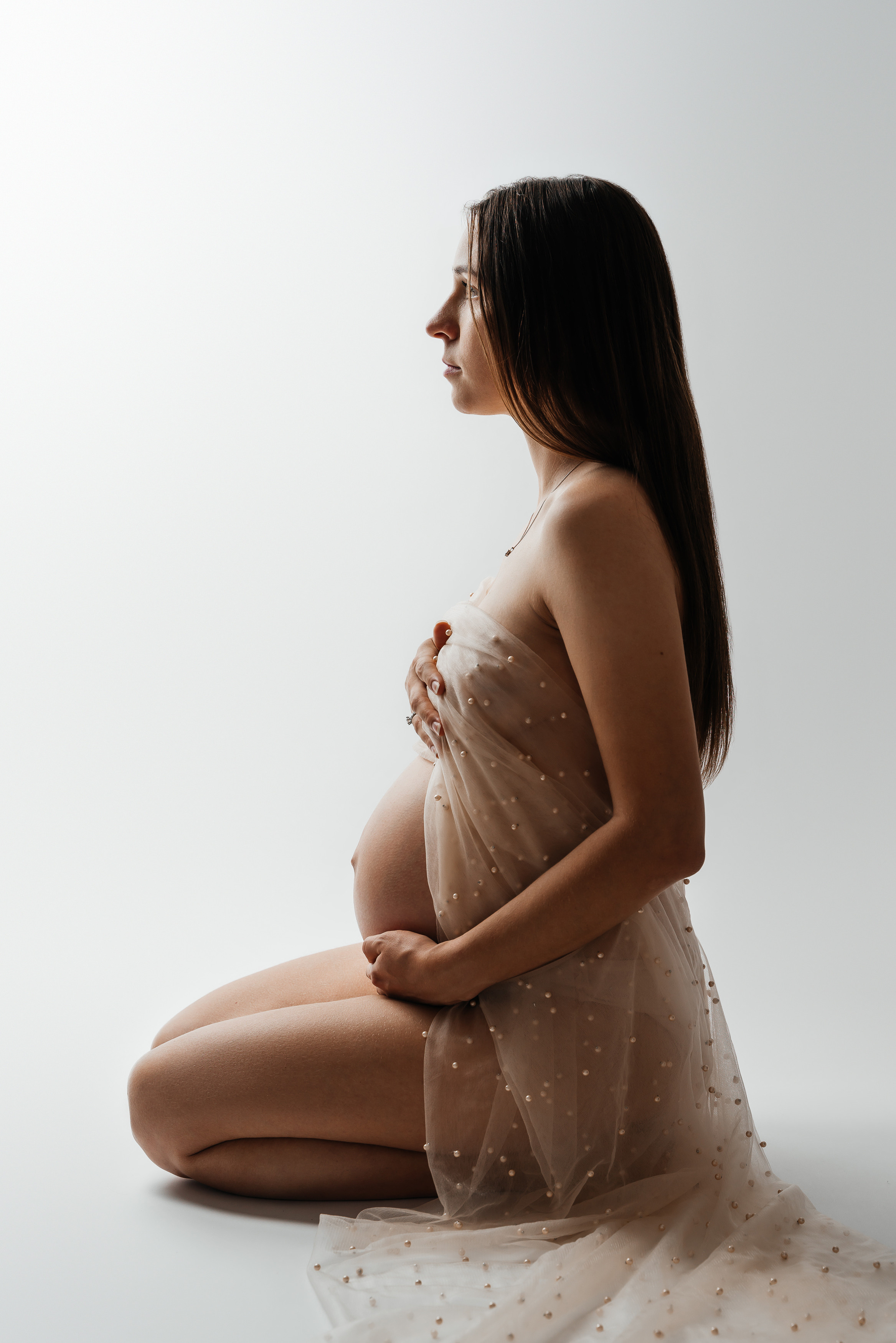 Pregnancy photo shoot in the studio