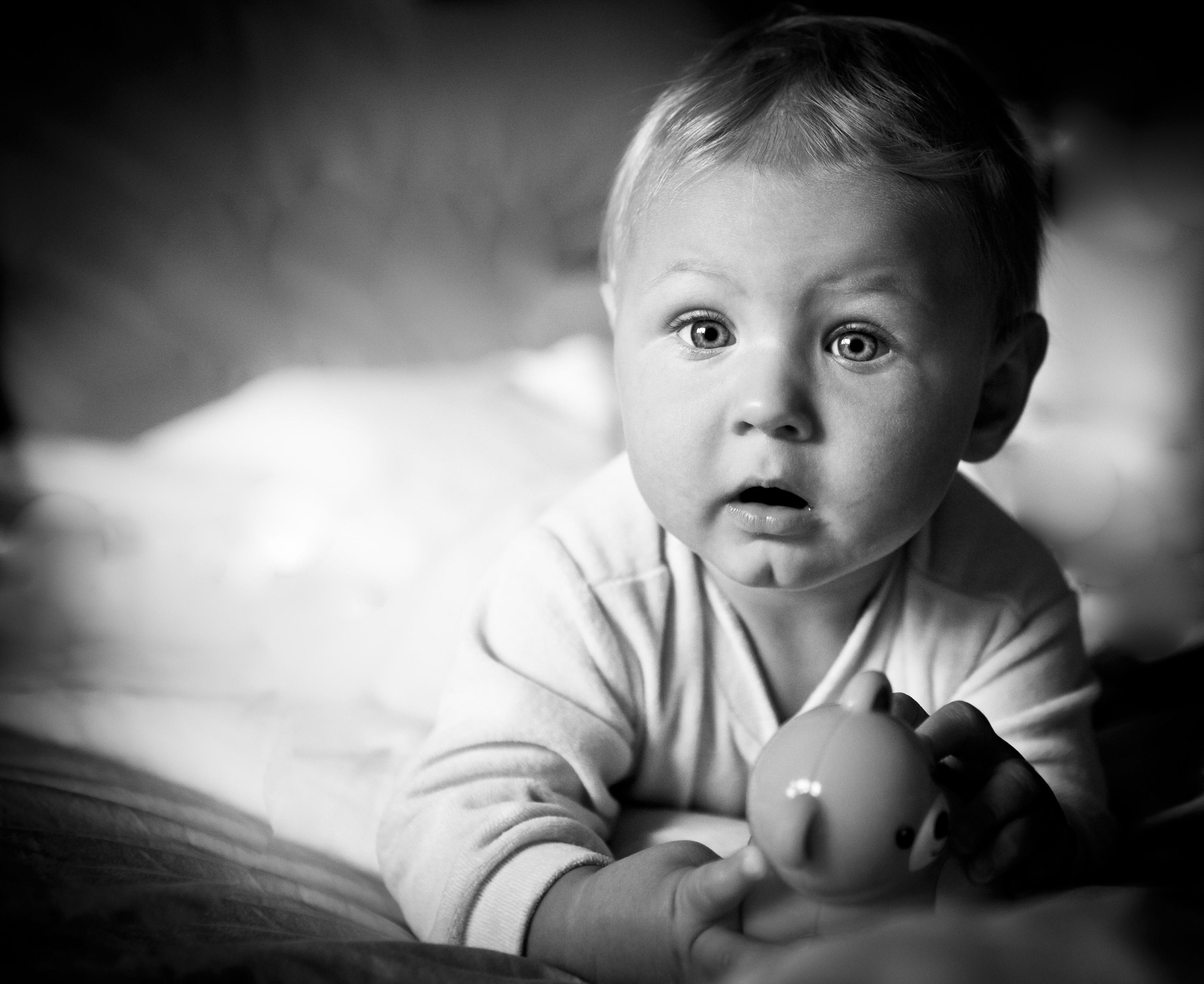 Toddler kid playing with a toy