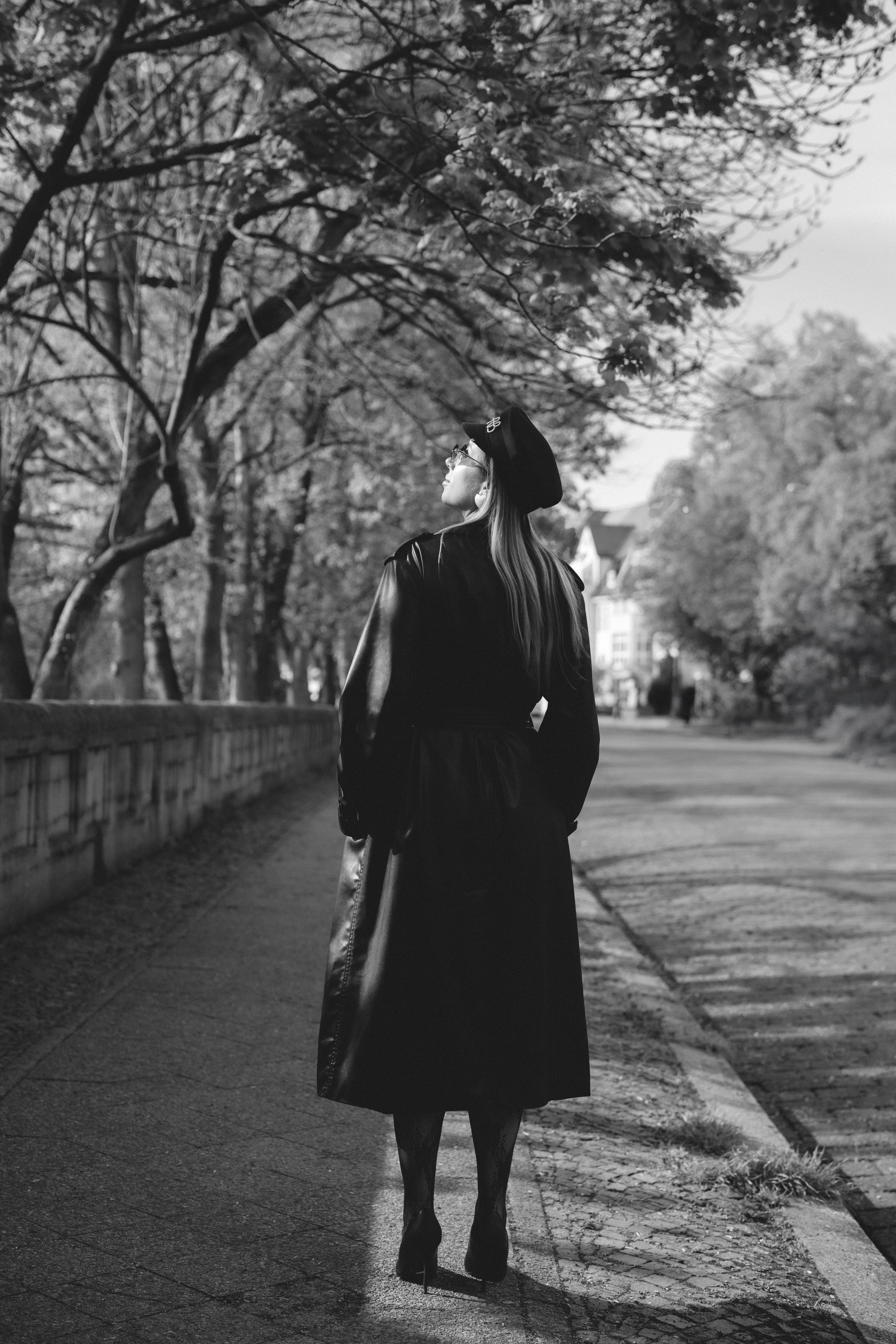 Street Portrait in Leipzig. Woman in black Leather Coat. Stylish. Charismatic Photography by Kristina Kozheltsova. Kristina Kozheltsova- Soulful Portrait&Lifestyle&Love Story Photographer in Leipzig, Germany