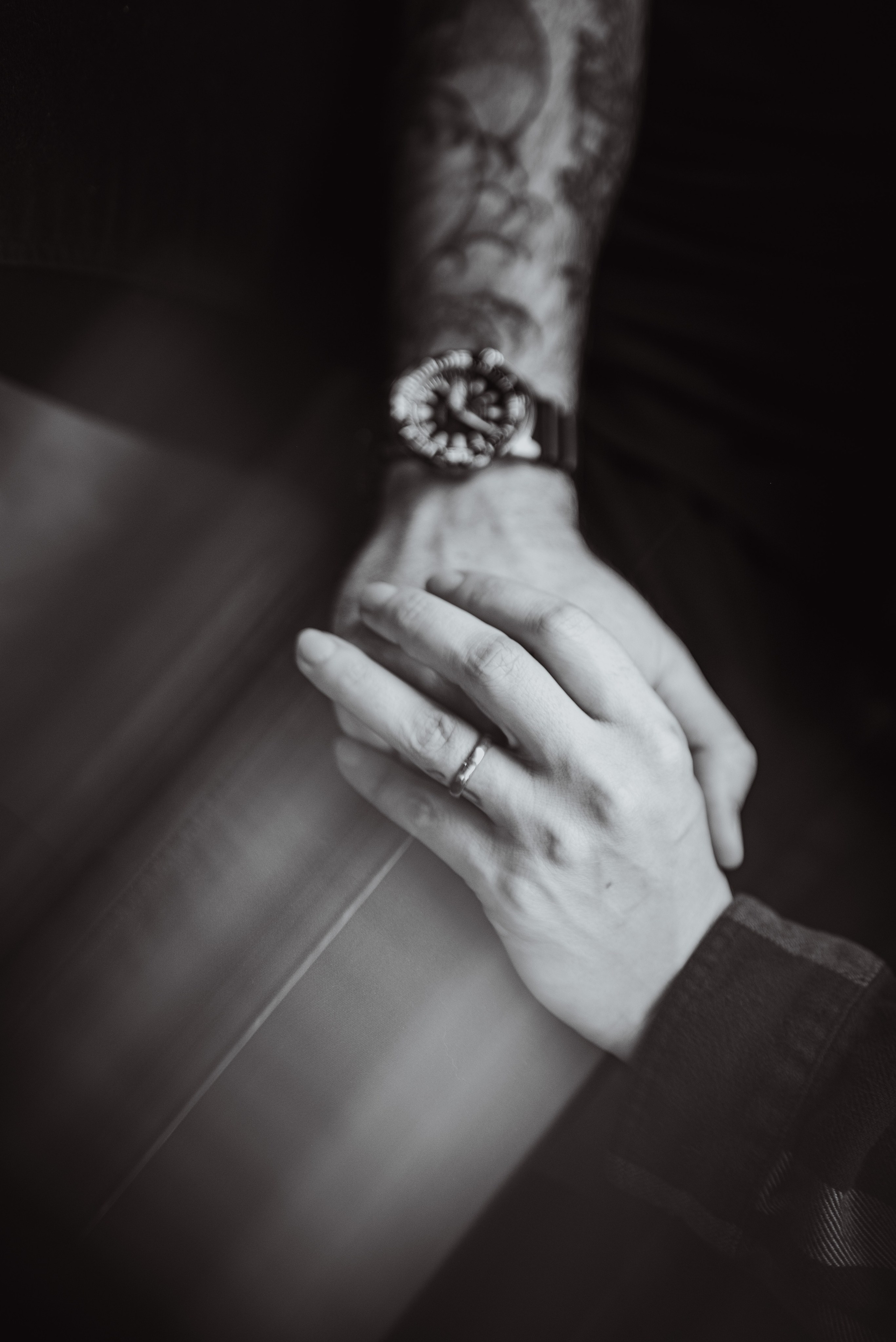 Black and white couple portrait taken in Green Bay, Wisconsin, a work of an Amlab photography school artist who is always improving their photography skills.