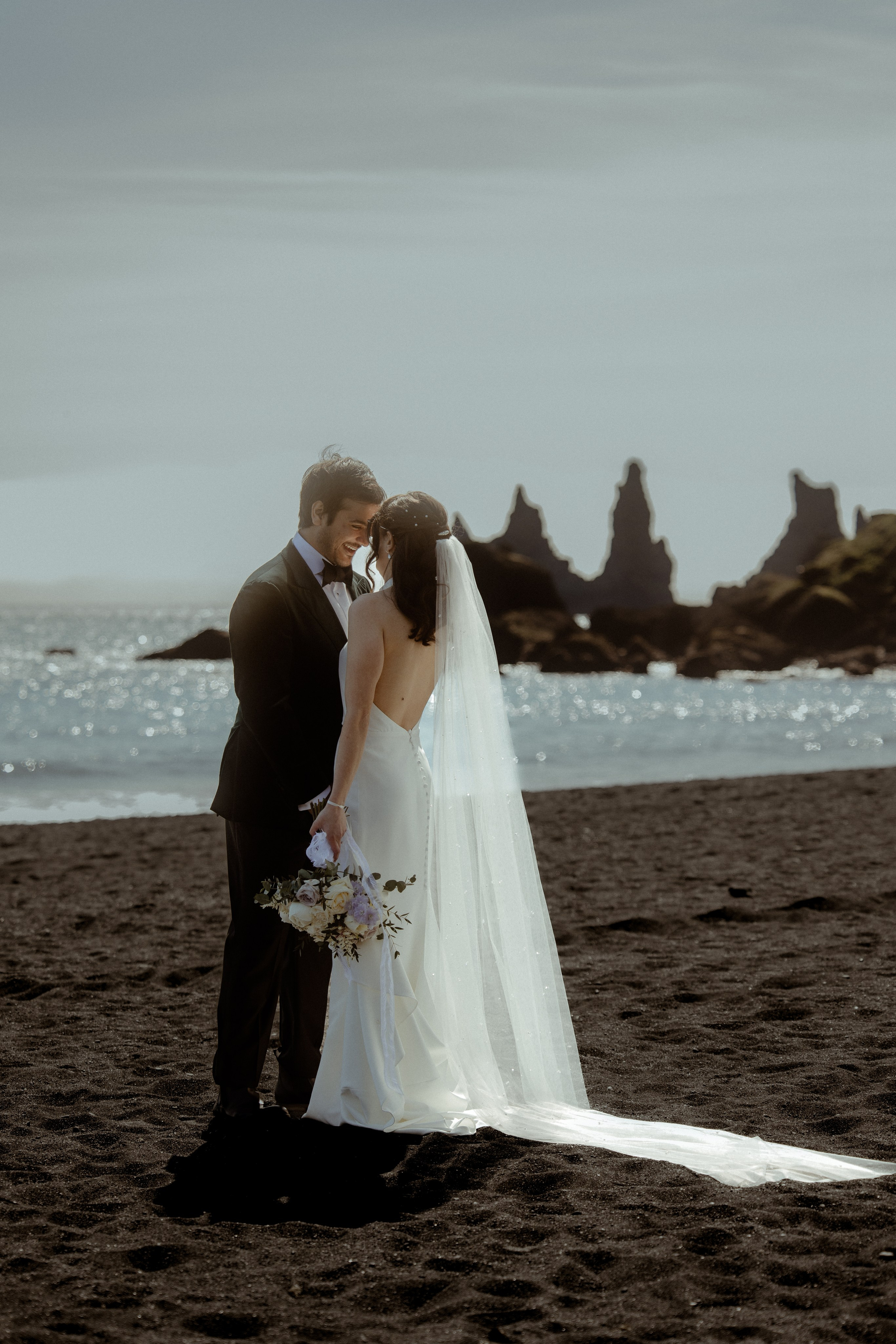 Iceland elopement at endless black sand beach. Iceland elopement photographer & videographer