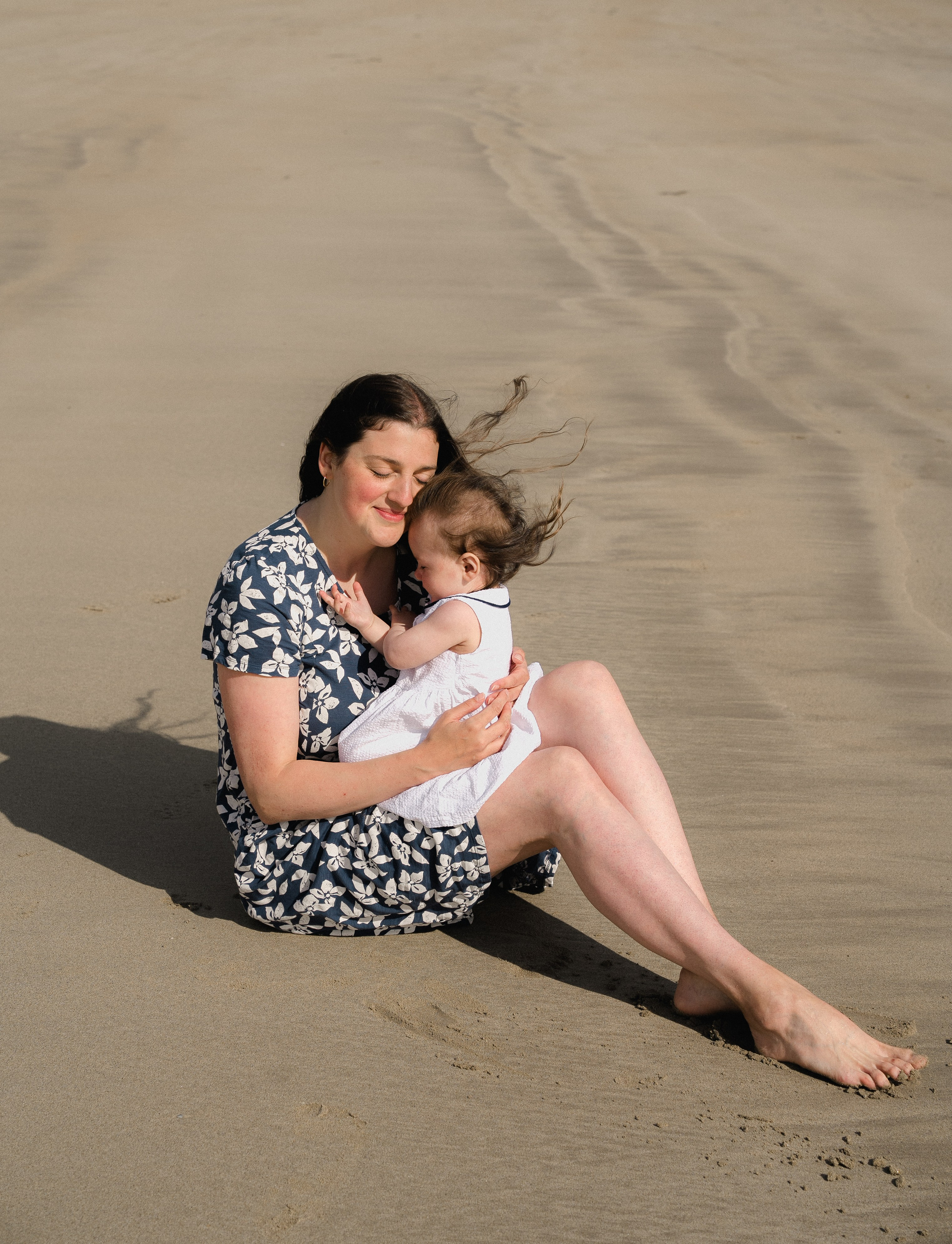 Darya and Mia at the ocean. Wedding and family photographer Ireland