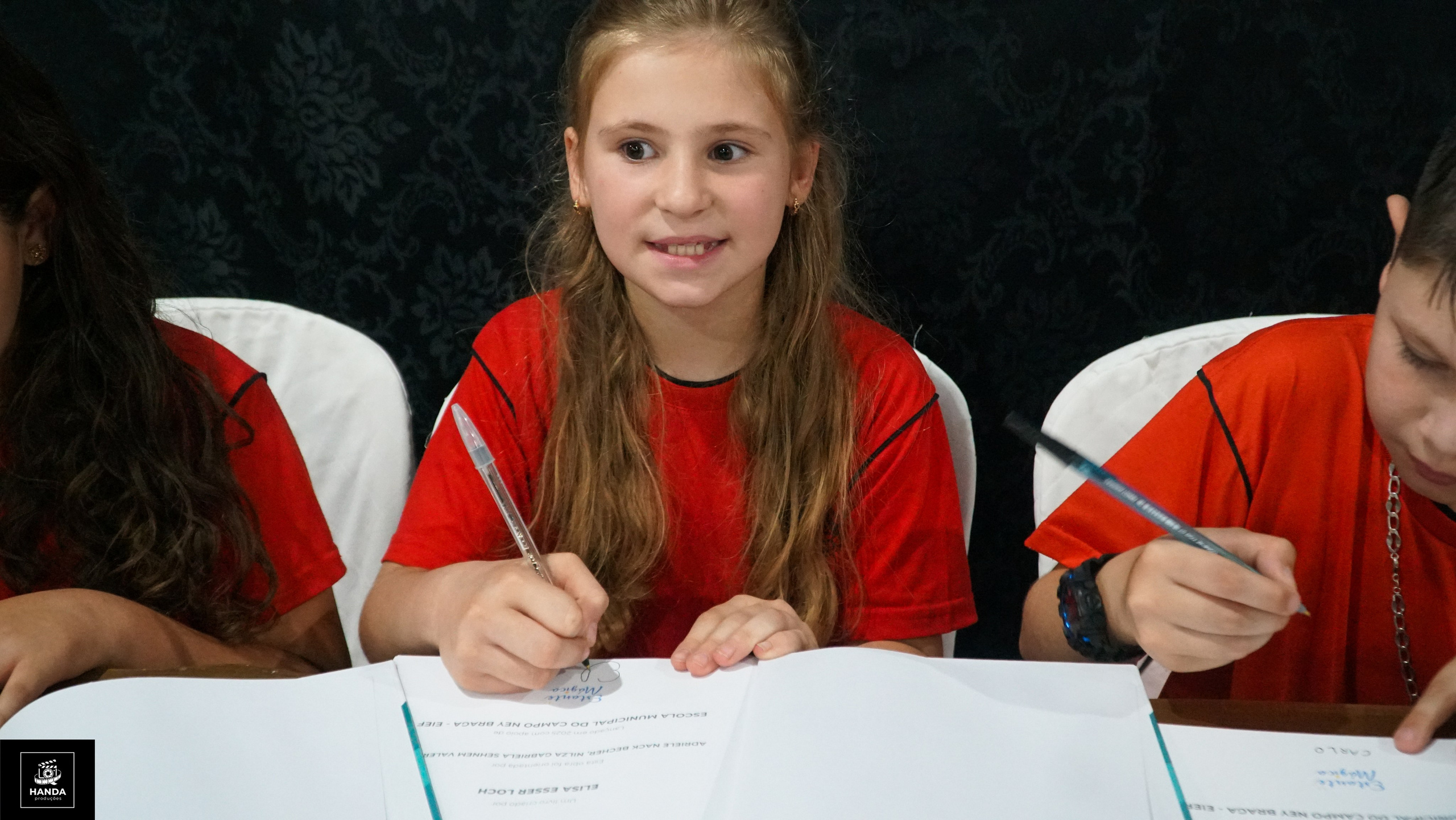 Noite autógrafos colégio Aurélio Buarque de Holanda. Handa Produções