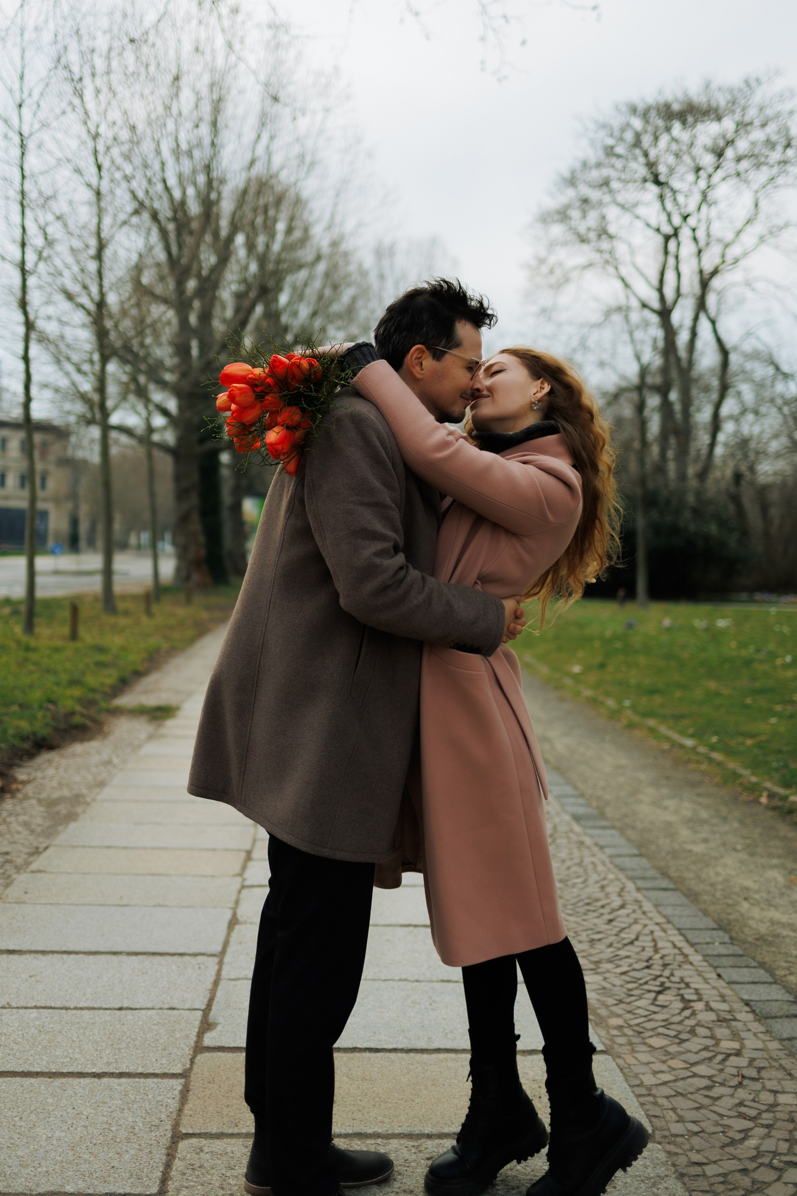 Love Story in Leipzig Park. Emotional&Cinematic Couple Photoshoot by Kristina Kozheltsova. Kristina Kozheltsova- Soulful Portrait&Lifestyle&Love Story Photographer in Leipzig, Germany