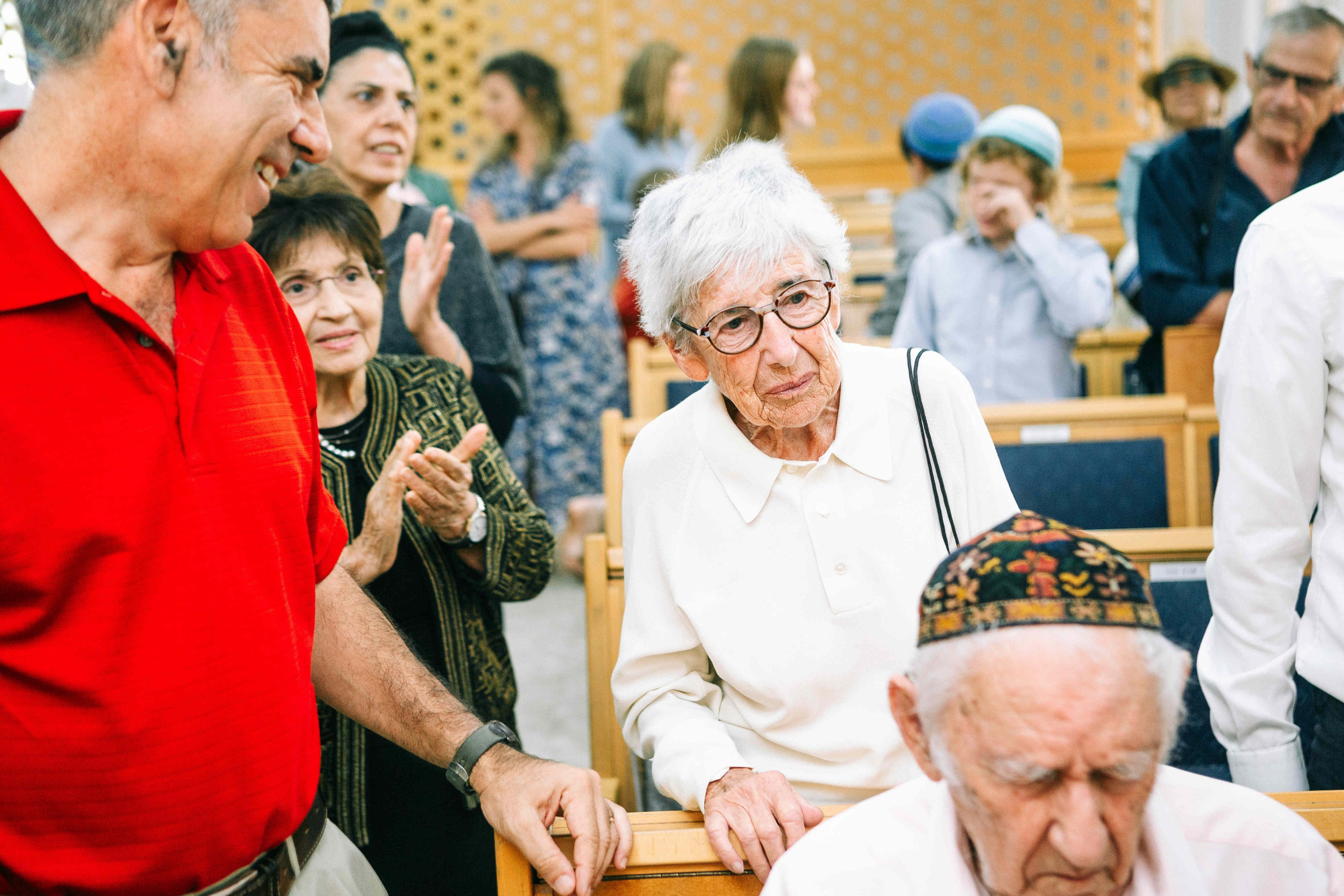 BRITH MILA IN THE SMALL SYNAGOGUE. PHOTOGRAPHER IN ISRAEL