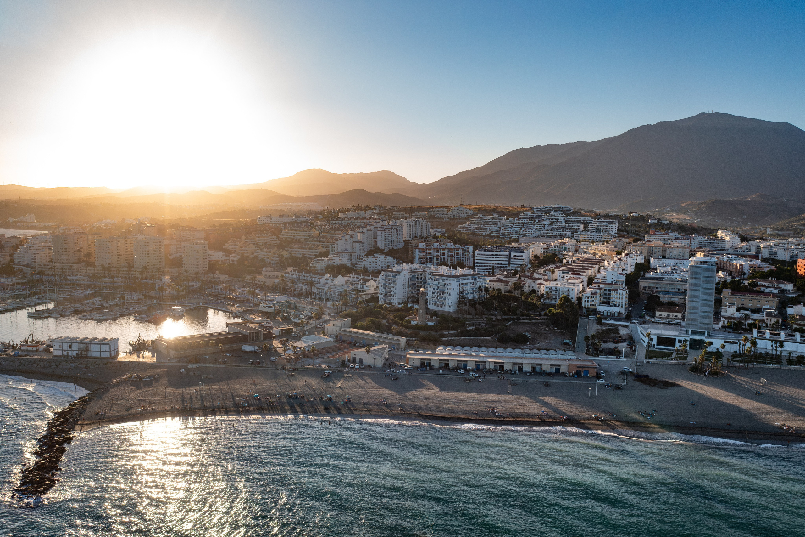 Stunning view of Estepona waterfront and cityscape from a drone