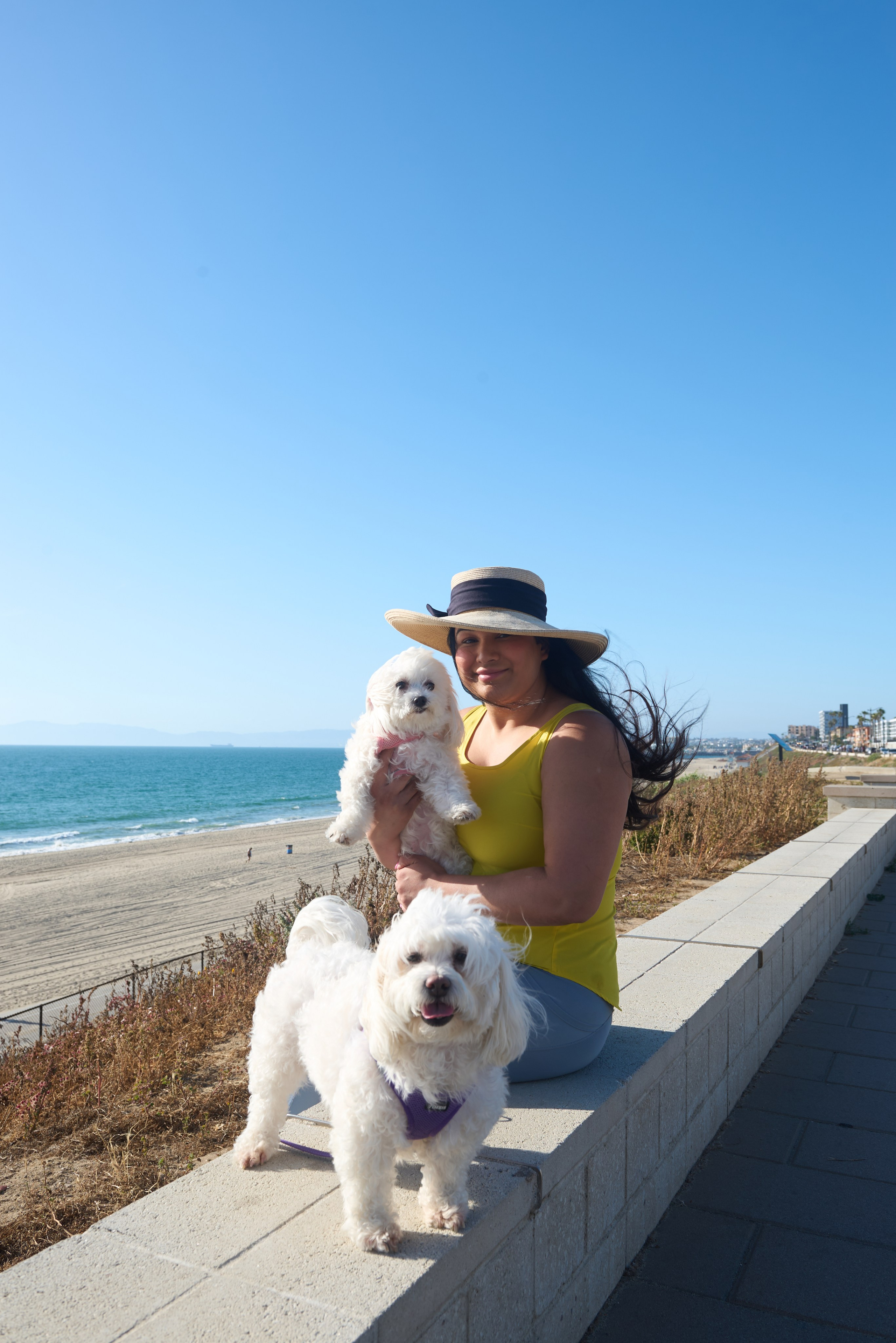 Artistic black and white portrait of a dog and its human photographed in Los Angeles