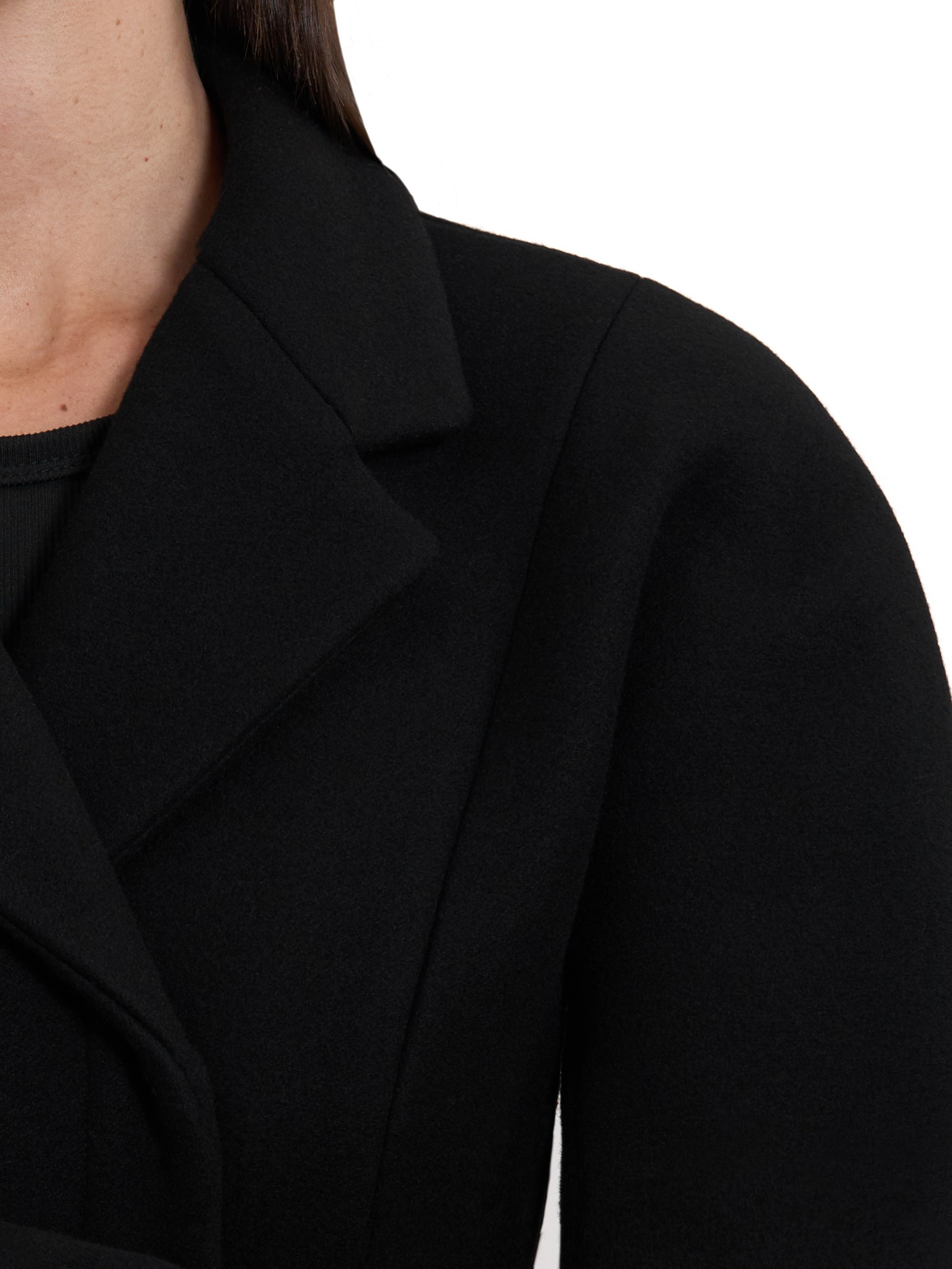 Jacquemus Curvo Coat/Catalog. Alisha Geva | Photographer in Dubai