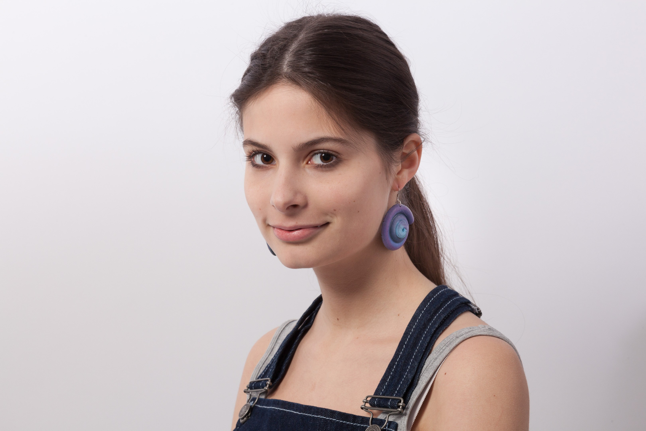 Portrait of a young girl on white studio background - photographer Andrey Dunin