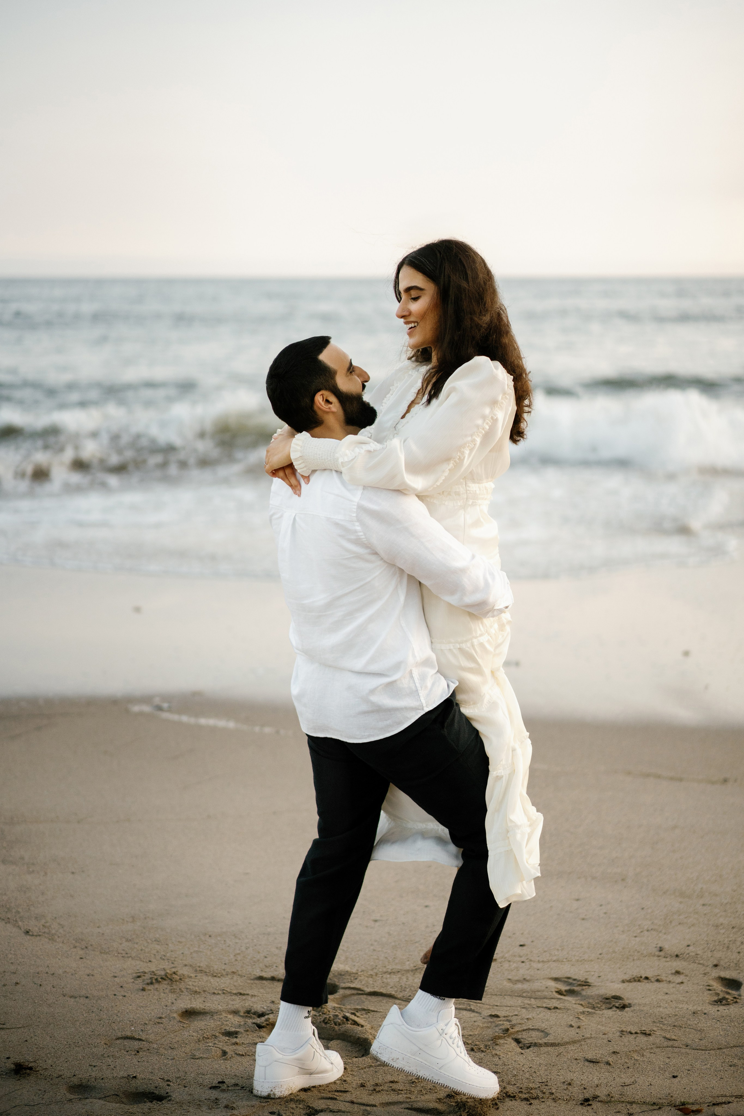 Santa Monica Sunset Engagement Photoshoot. Wedding Photography & Videography Team in California, Los Angeles, San Francisco, San Diego and Travel