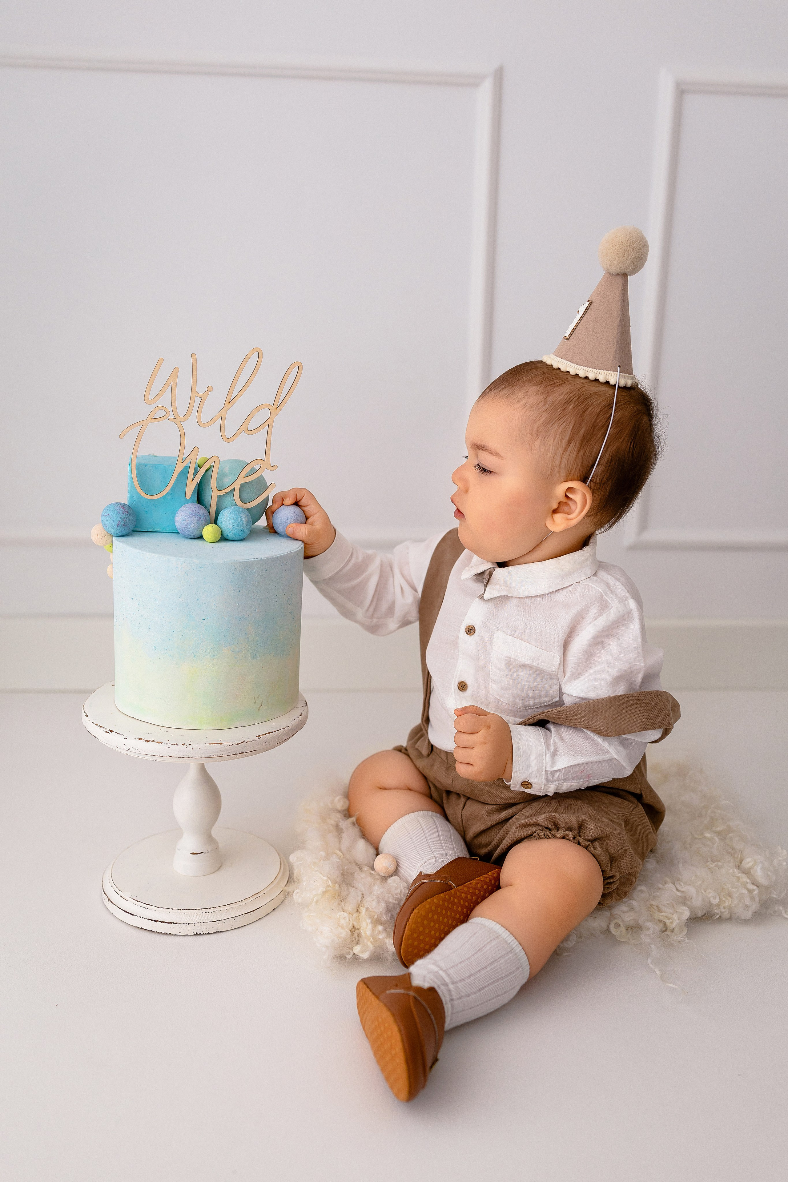 Erste Geburtstag „Cake Smash“. Neugeborene- Schwangerschaft- und Kinder Fotografin in Lehre