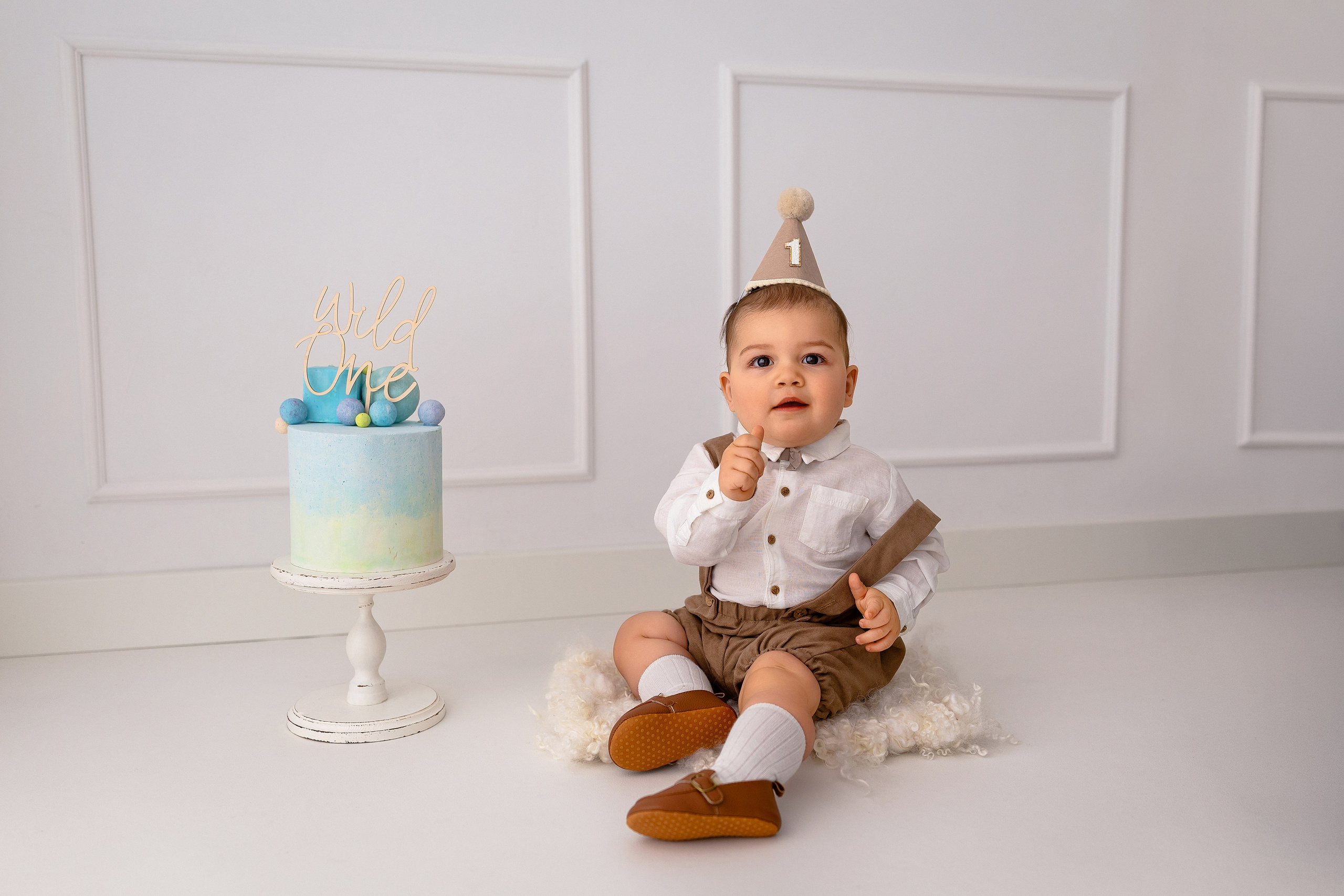 Erste Geburtstag „Cake Smash“. Neugeborene- Schwangerschaft- und Kinder Fotografin in Lehre