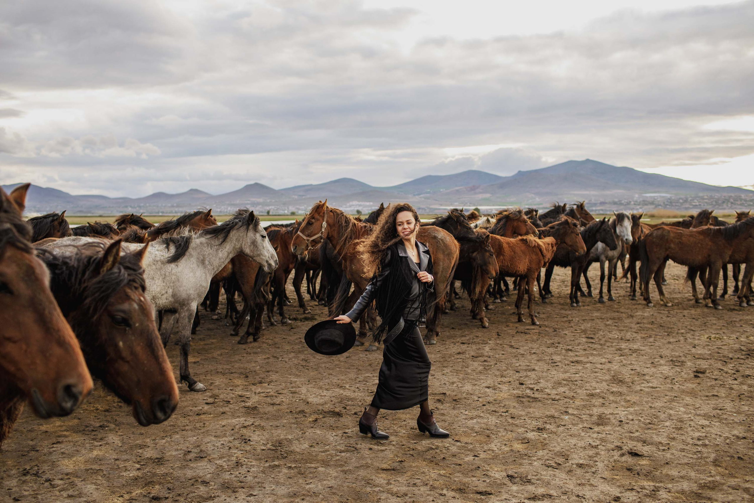 Solo Photoshoot in Kayseri with Wild Horse Herds. Julia Ganch I Fashion Wedding Photography I Cappadocia Turkey