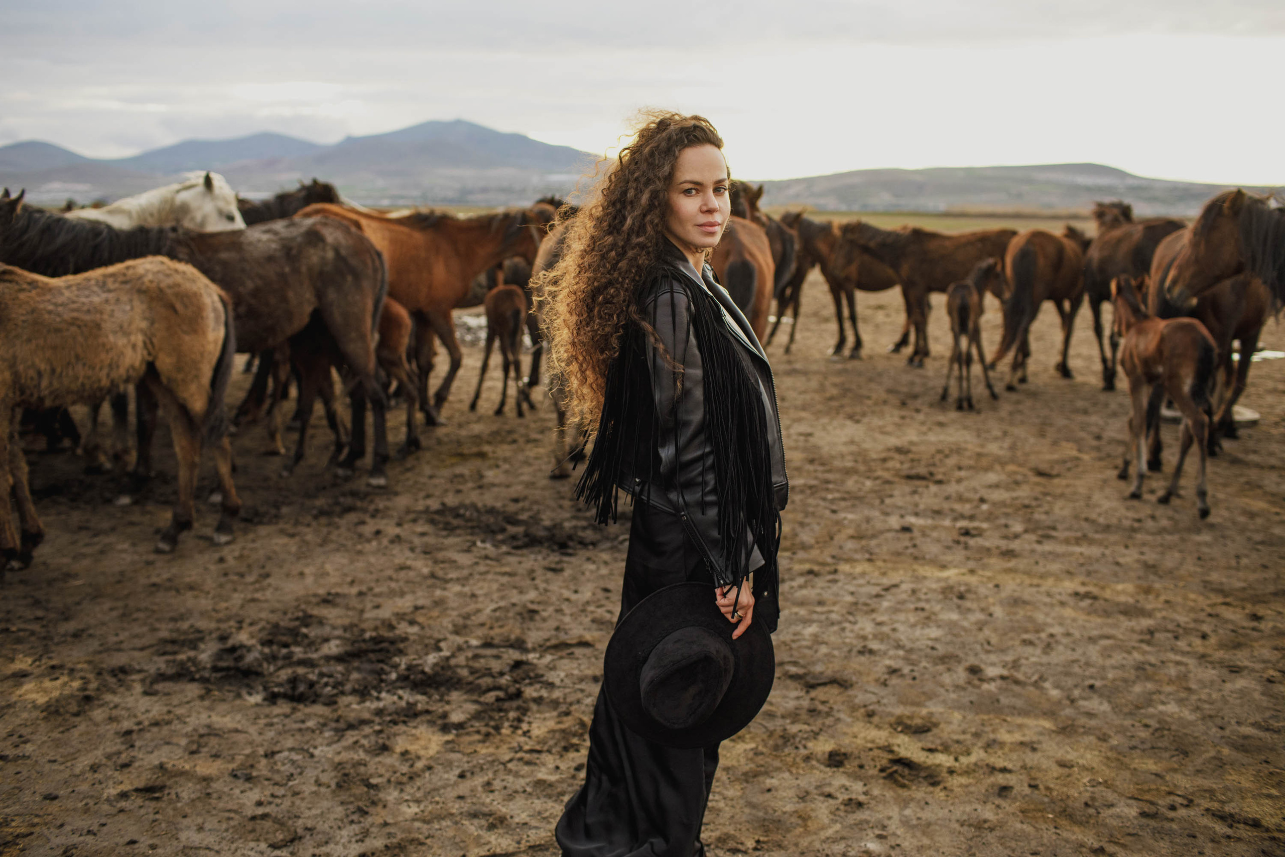 Solo Photoshoot in Kayseri with Wild Horse Herds. Julia Ganch I Fashion Wedding Photography I Cappadocia Turkey