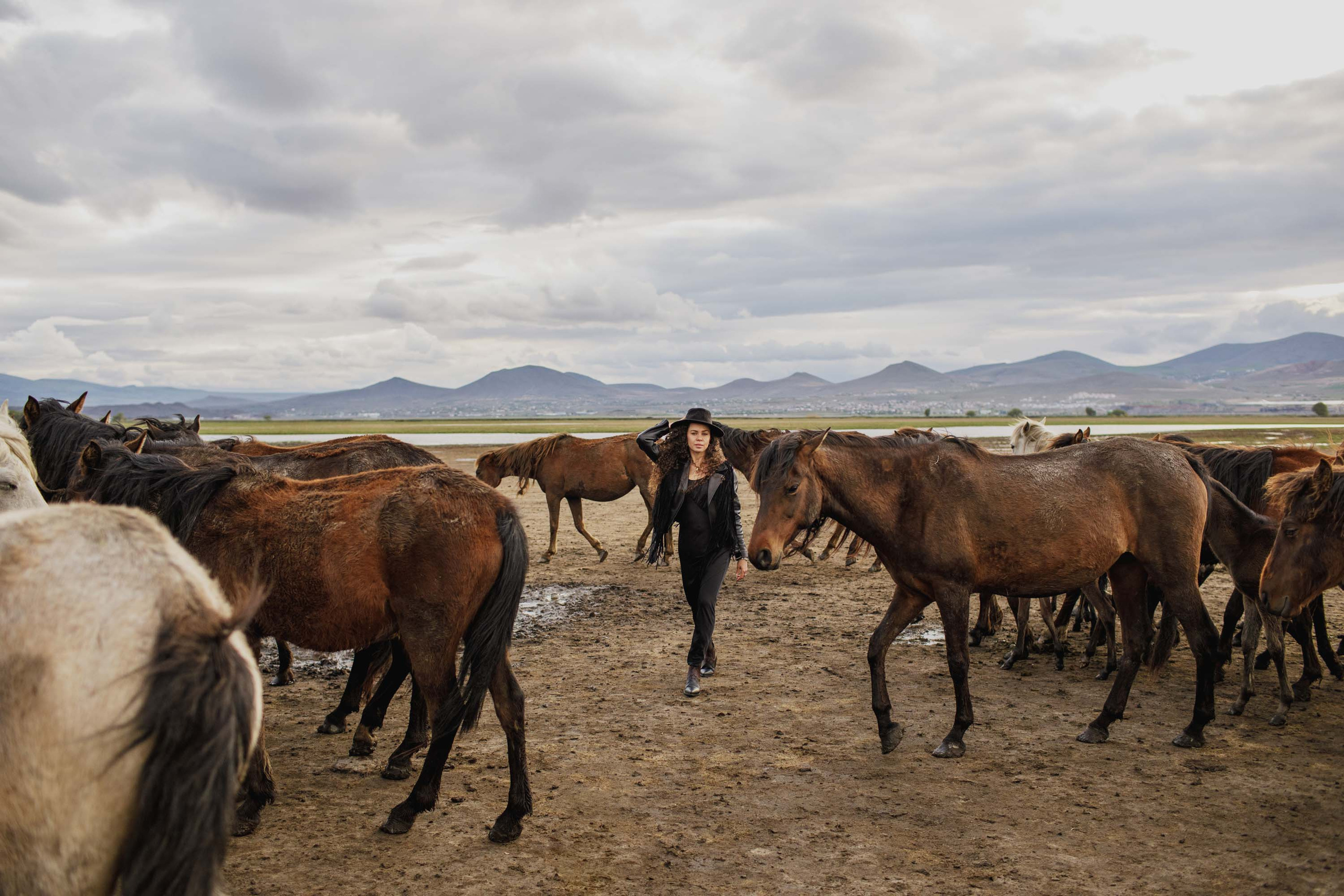 Solo Photoshoot in Kayseri with Wild Horse Herds. Julia Ganch I Fashion Wedding Photography I Cappadocia Turkey