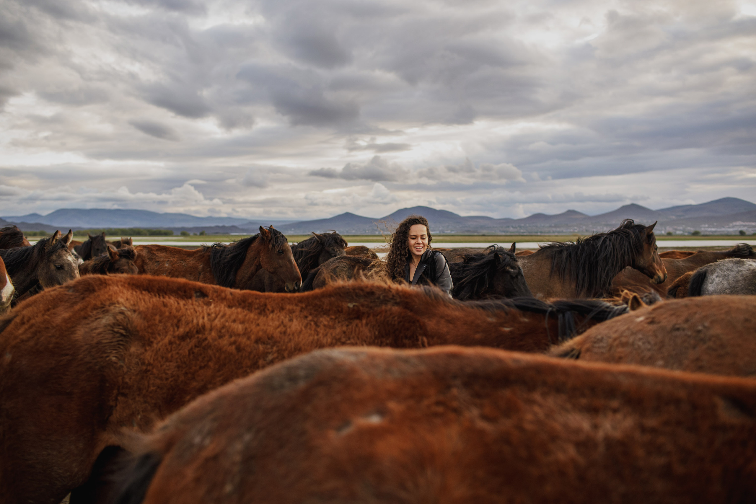 Solo Photoshoot in Kayseri with Wild Horse Herds. Julia Ganch I Fashion Wedding Photography I Cappadocia Turkey