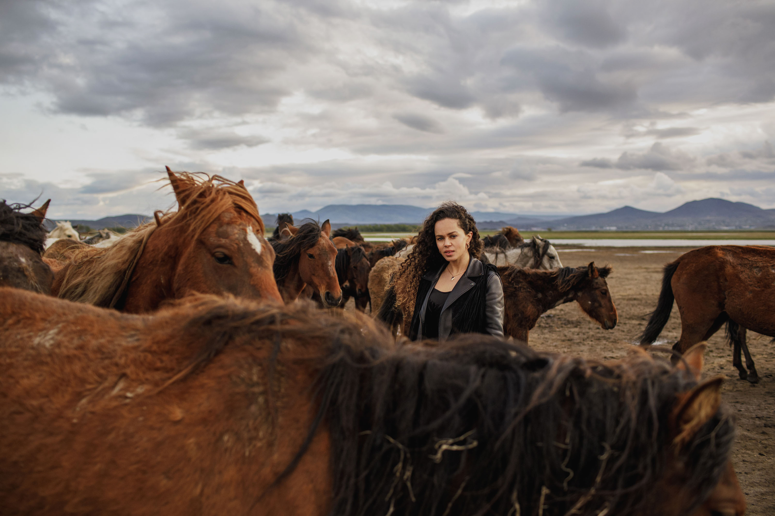 Solo Photoshoot in Kayseri with Wild Horse Herds. Julia Ganch I Fashion Wedding Photography I Cappadocia Turkey
