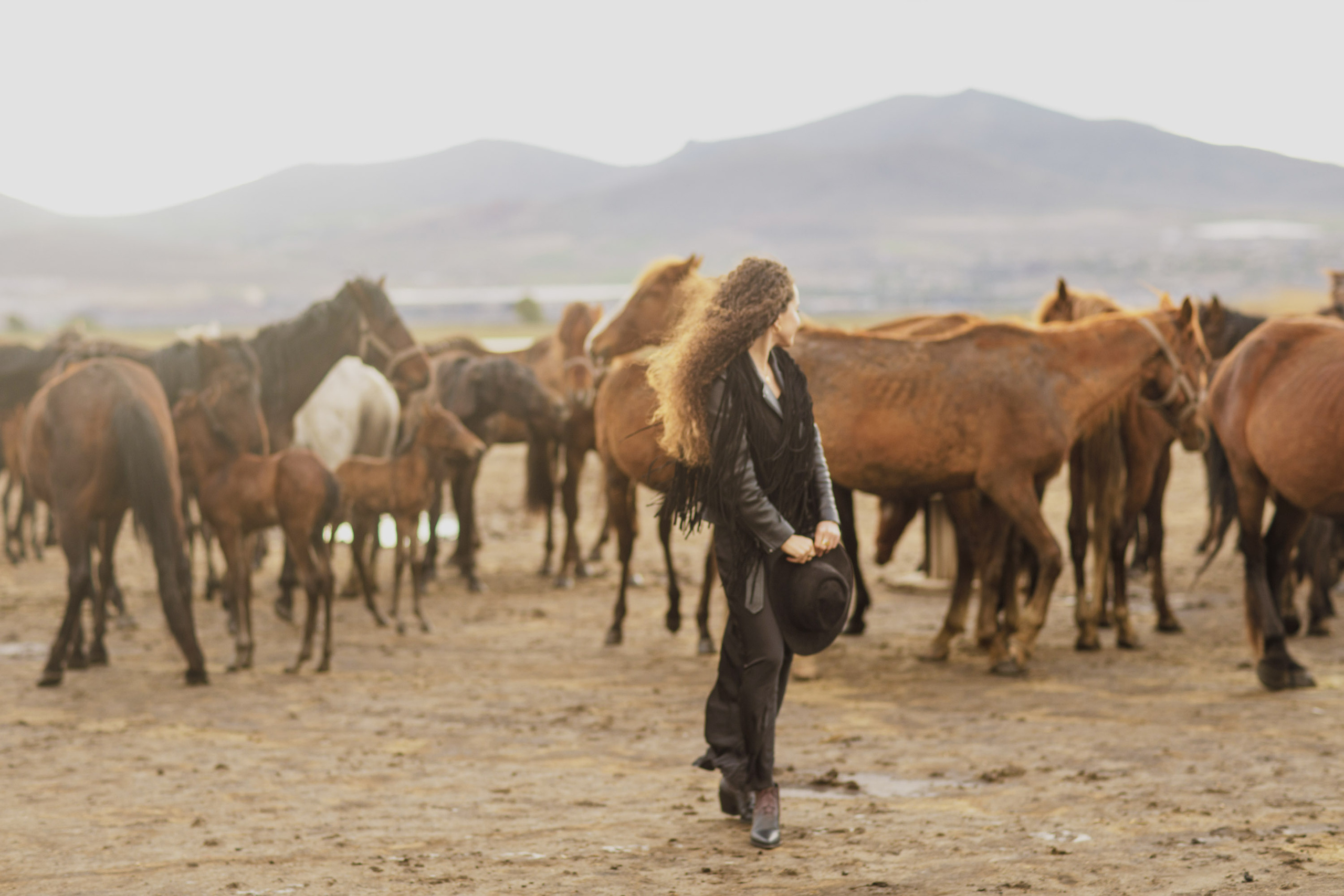 Solo Photoshoot in Kayseri with Wild Horse Herds. Julia Ganch I Fashion Wedding Photography I Cappadocia Turkey