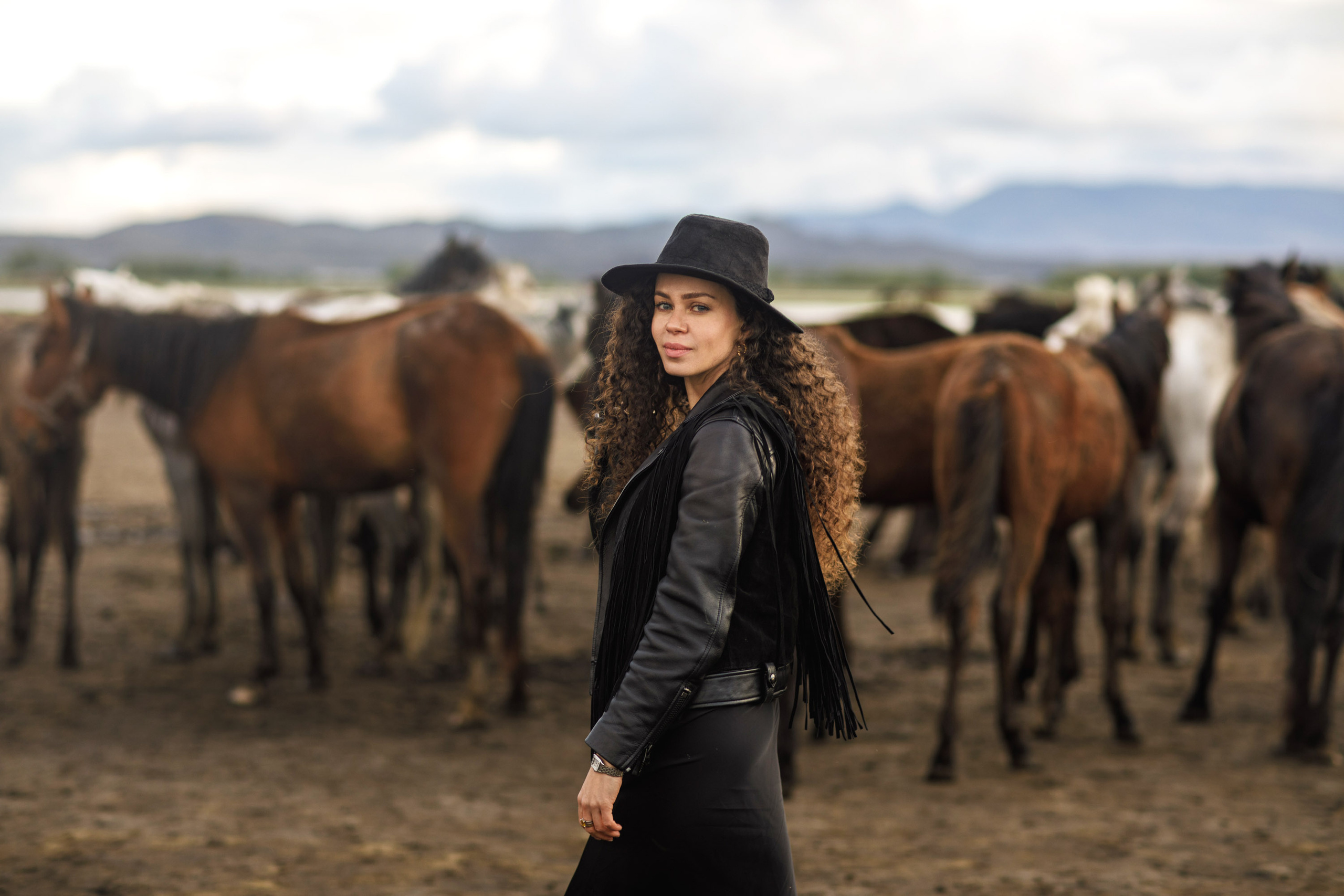 Solo Photoshoot in Kayseri with Wild Horse Herds. Julia Ganch I Fashion Wedding Photography I Cappadocia Turkey
