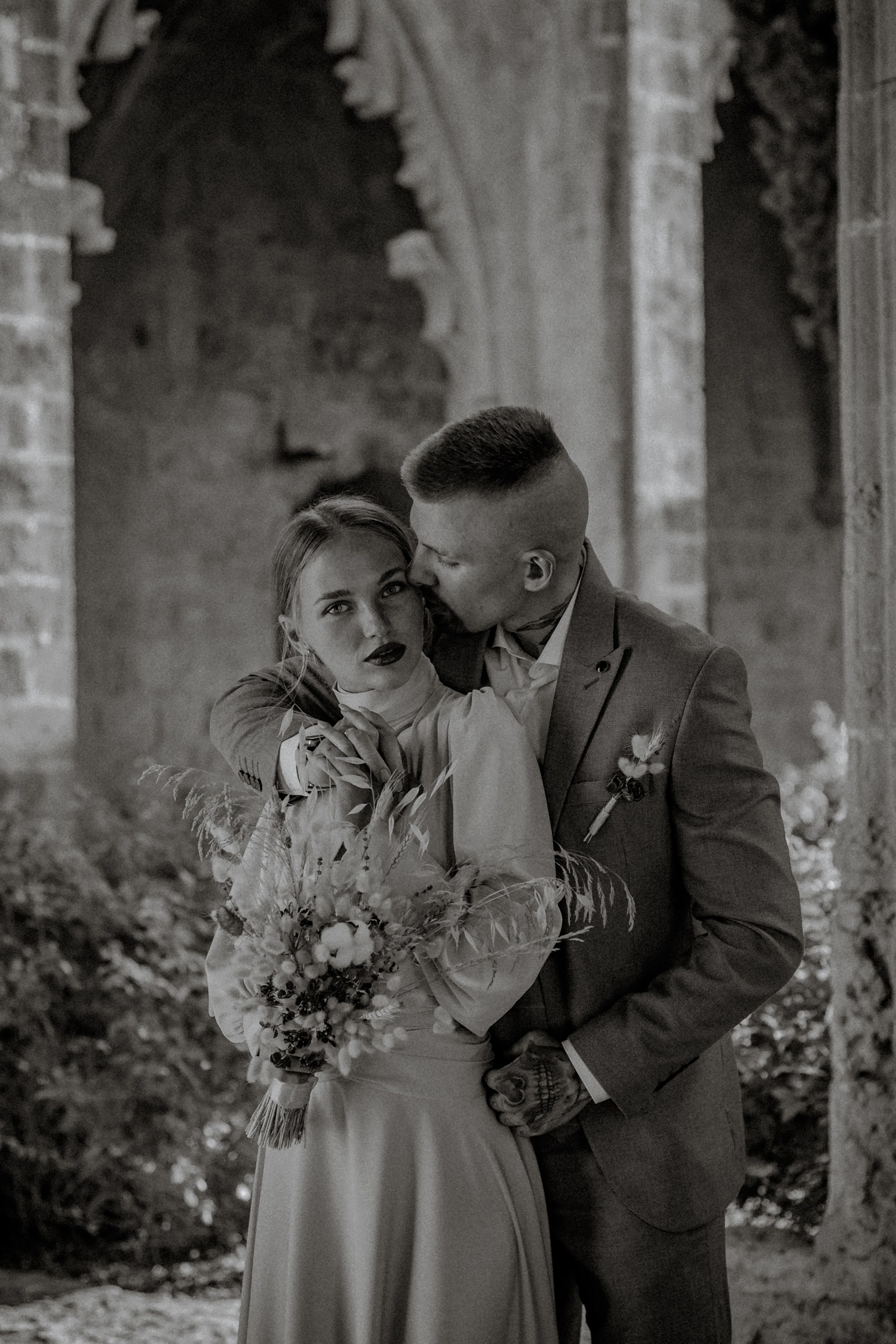 Taking wedding photographs of newlyweds