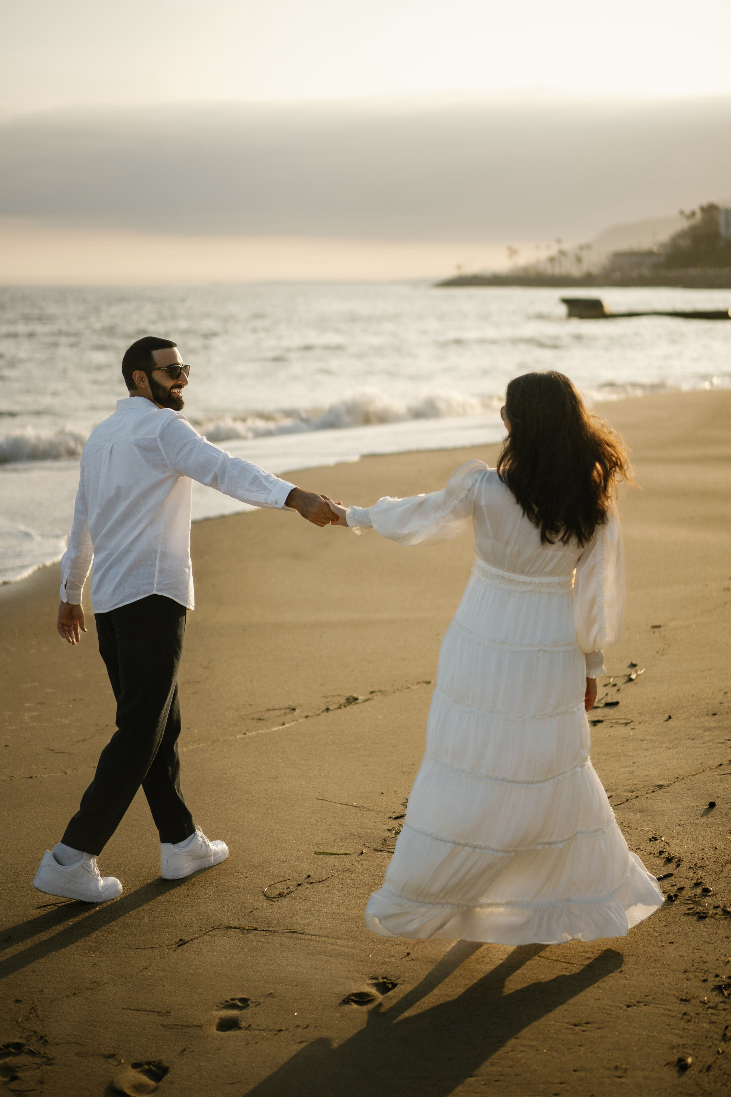 Santa Monica Sunset Engagement Photoshoot. Wedding Photography & Videography Team in California, Los Angeles, San Francisco, San Diego and Travel