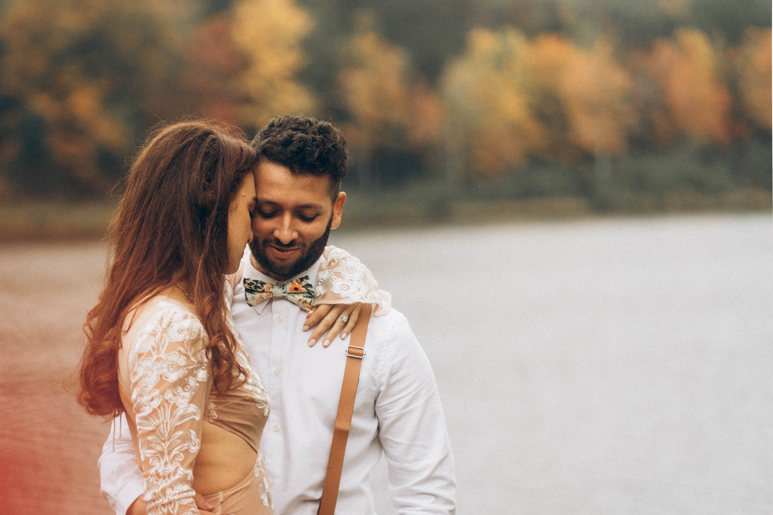 Candid wedding vow exchange captured by documentary-style photographer in Upstate New York