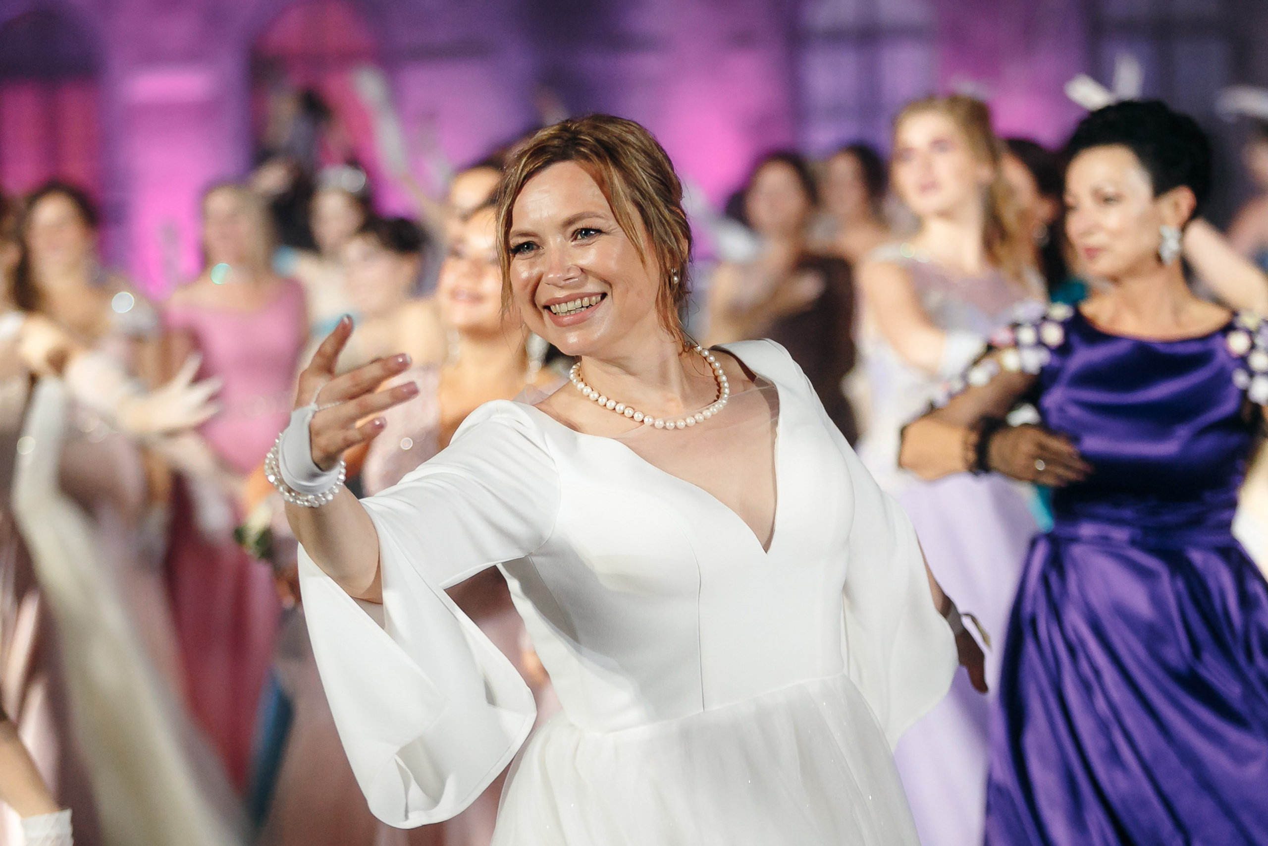 Guests dancing at wedding, festive mood