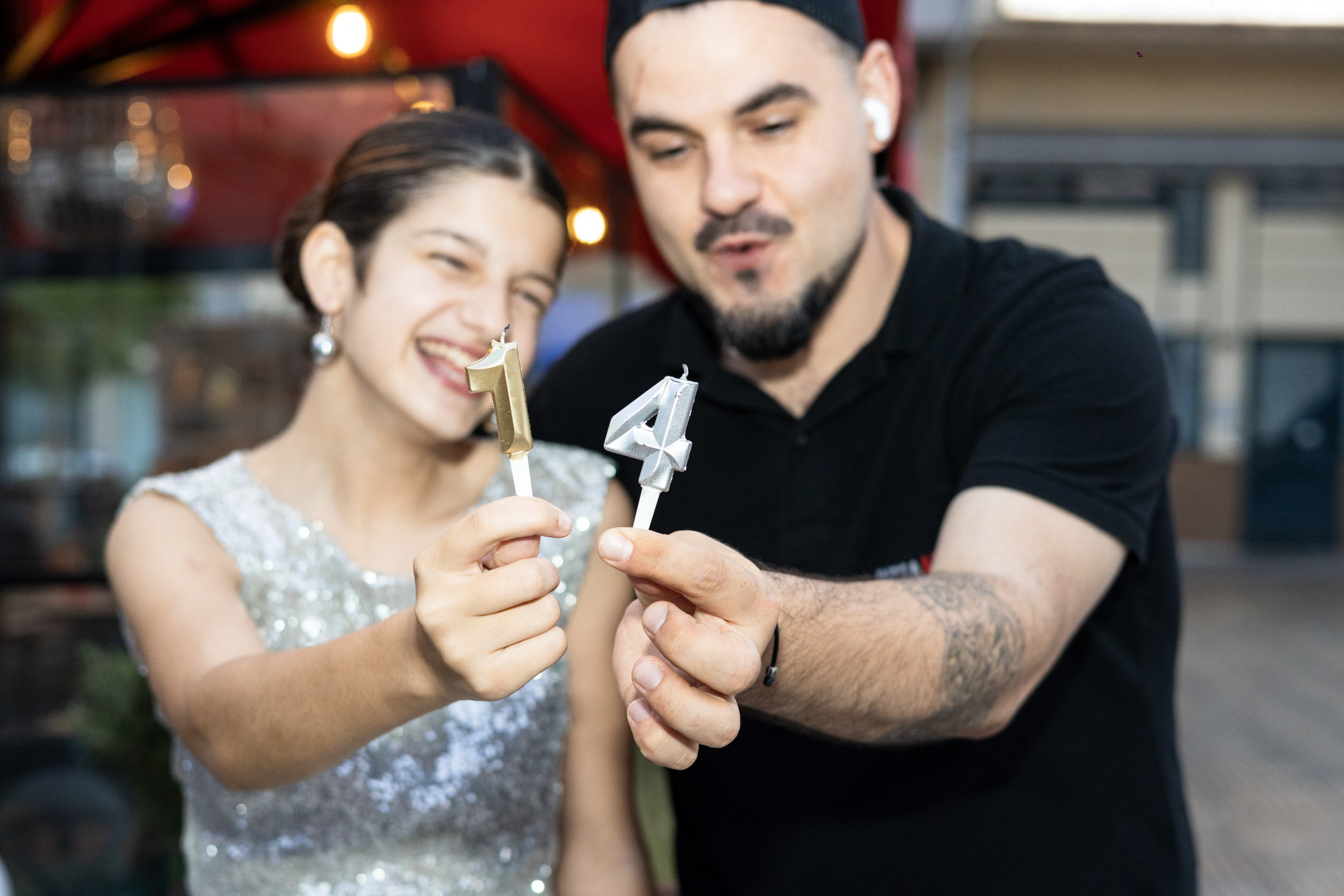 Guests smiling during a birthday celebration