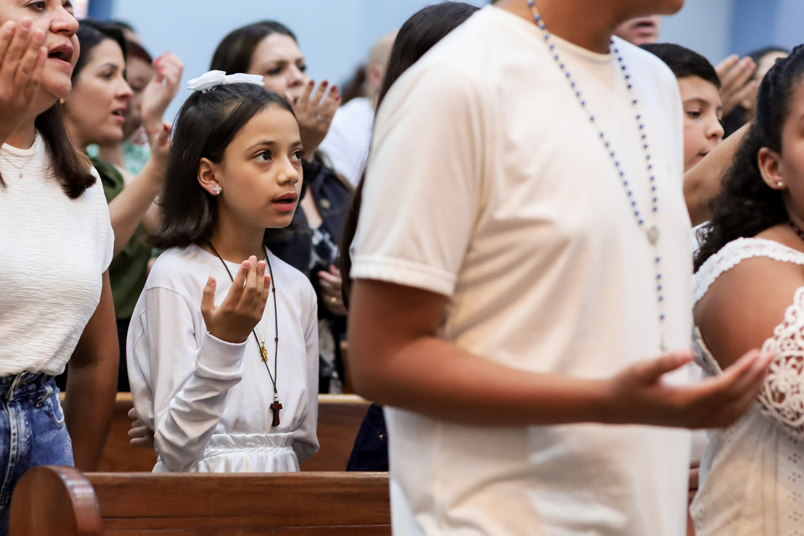 Primeira Eucaristia. Fotógrafo de momentos Sagrados