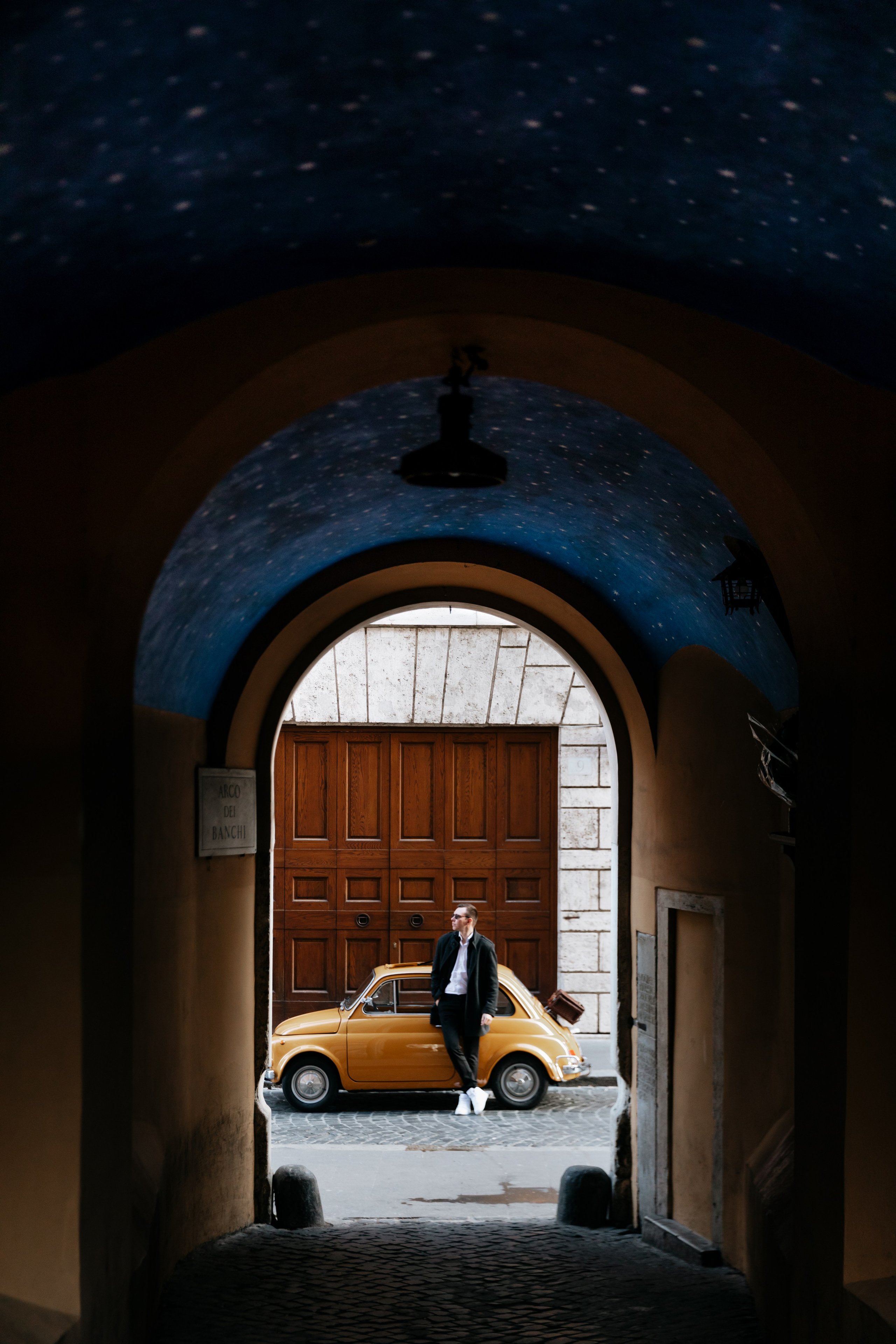 Fiat 500 and Vespa. Photographer in Rome