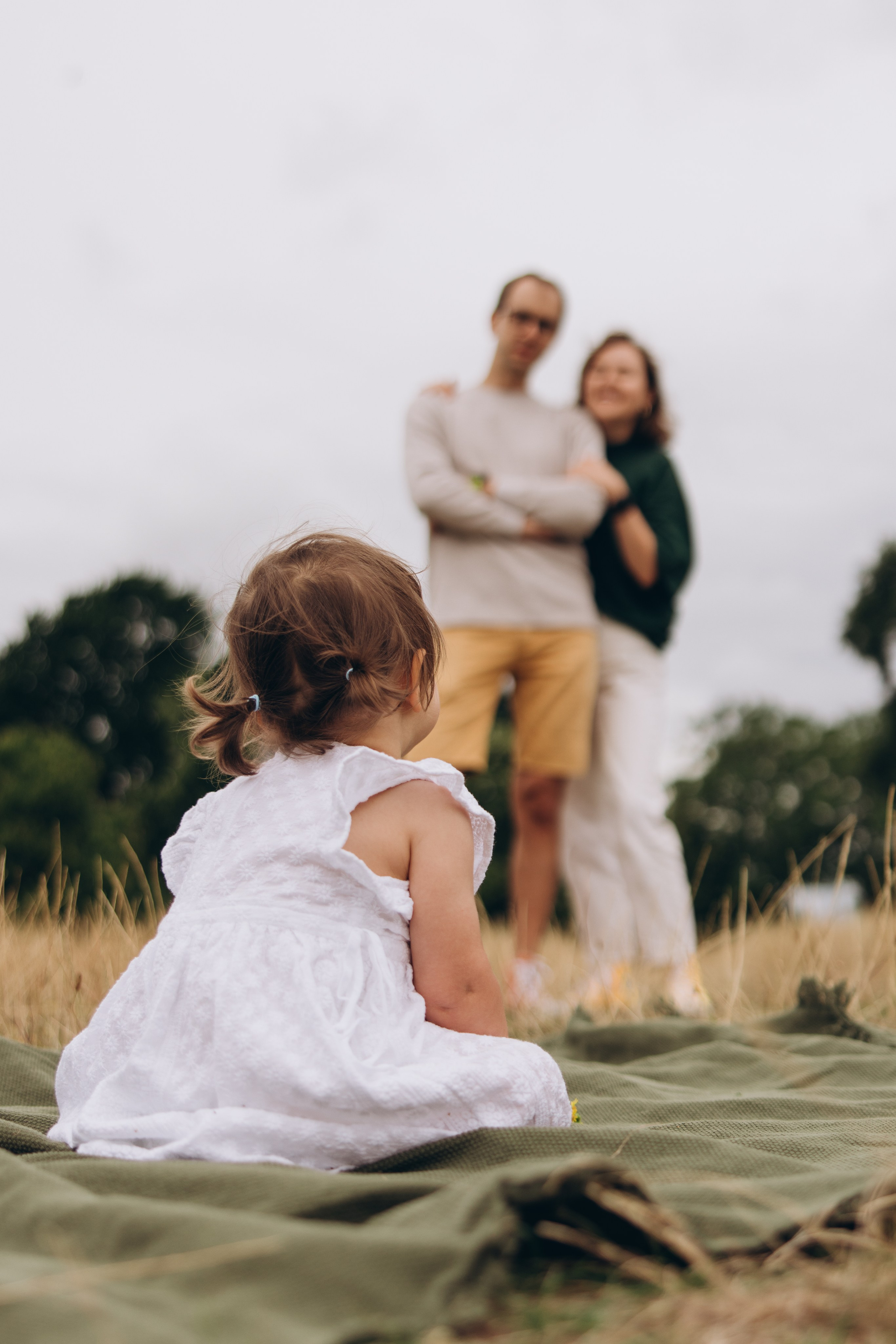 Milena with parents (Greenwich Park). Anastasia Klink, Photographer in London