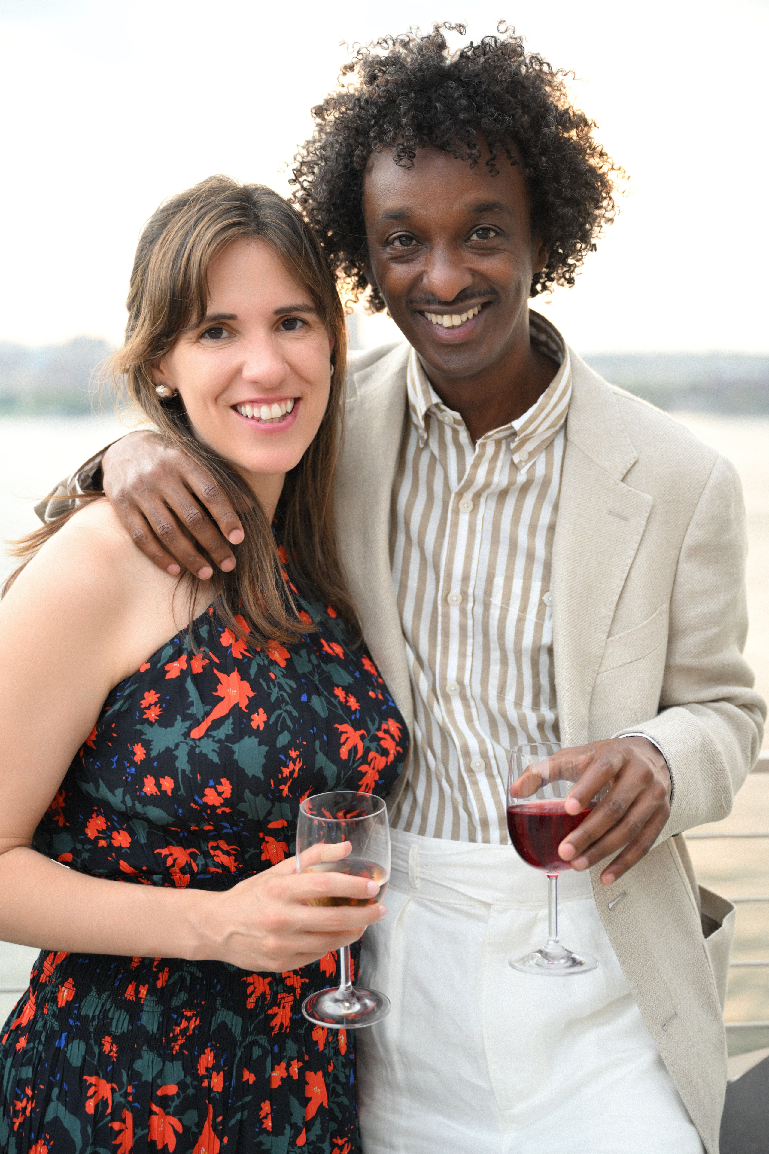 a man and woman are posing for a picture