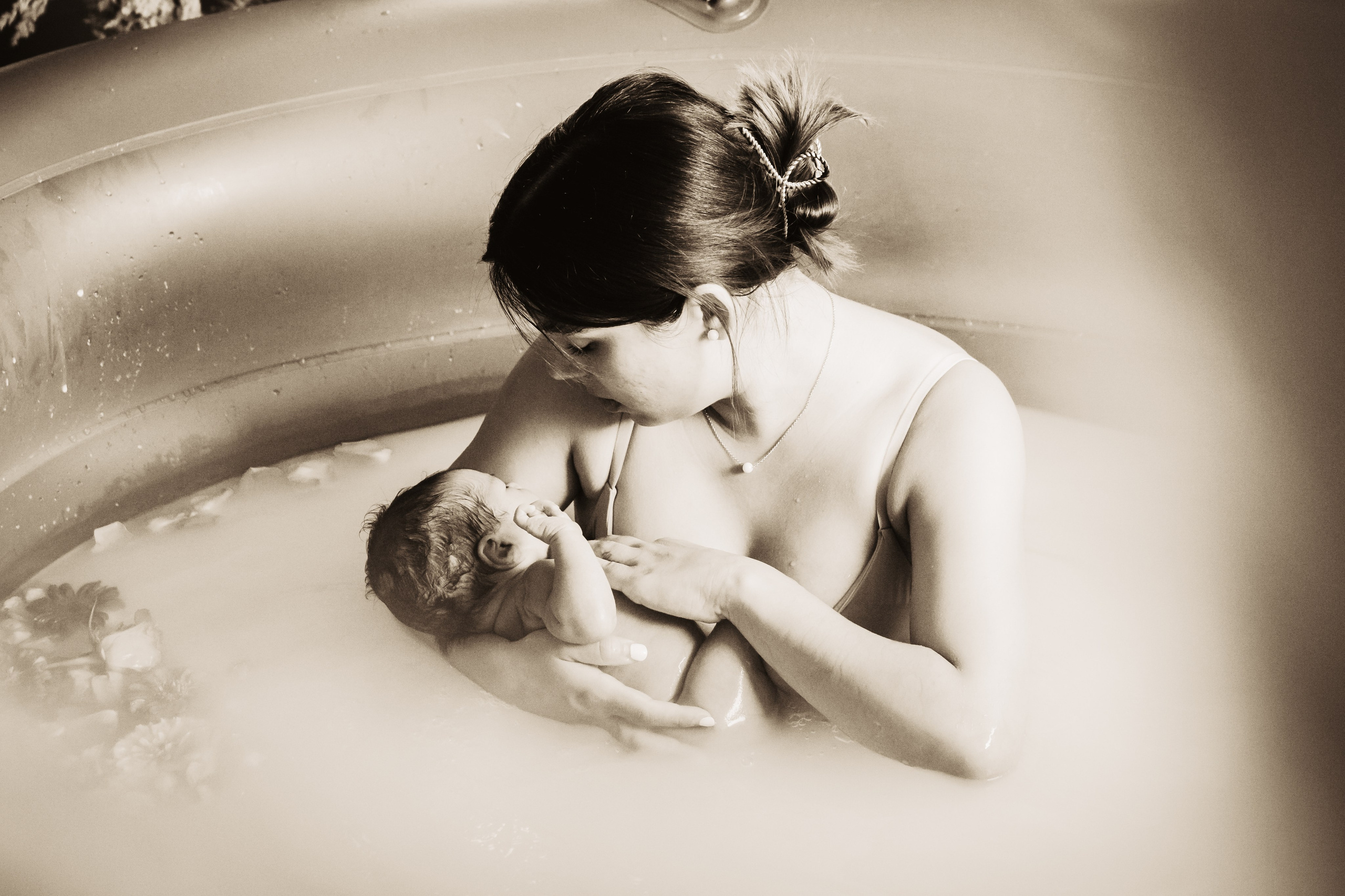 Monika, Pool newborn shooting. Family photographer Aargau Zurich