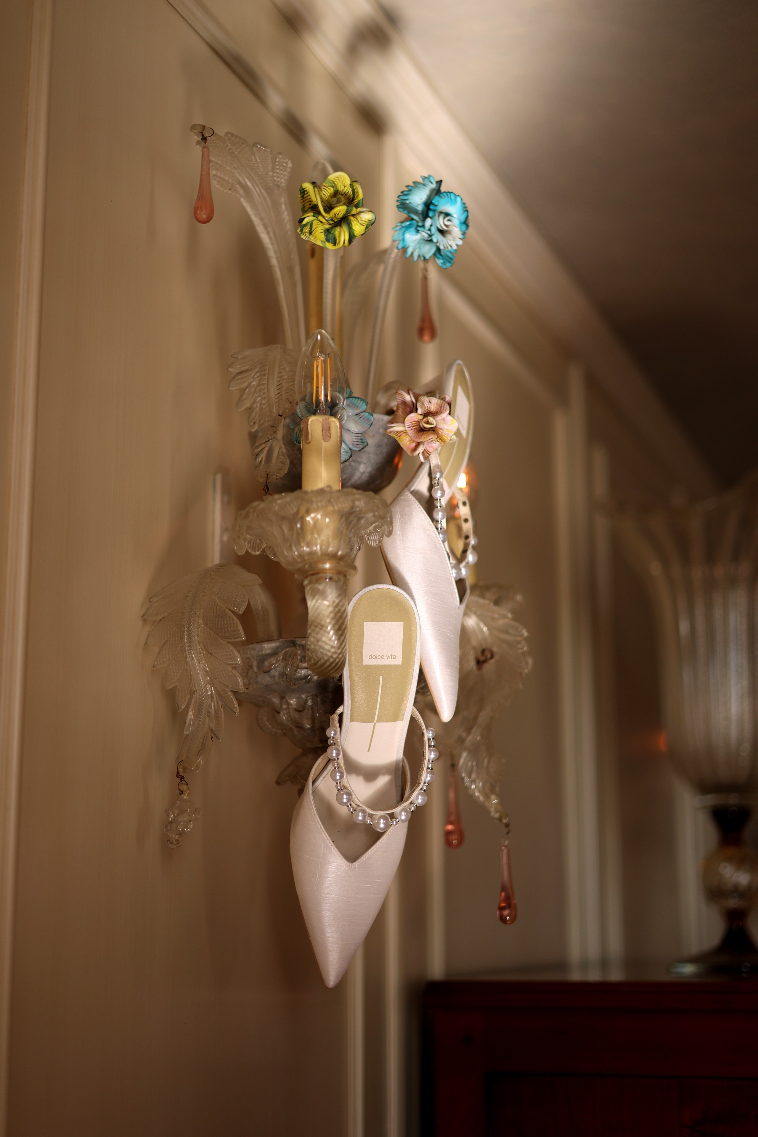 Close-up of wedding dress and accessories before the ceremony.